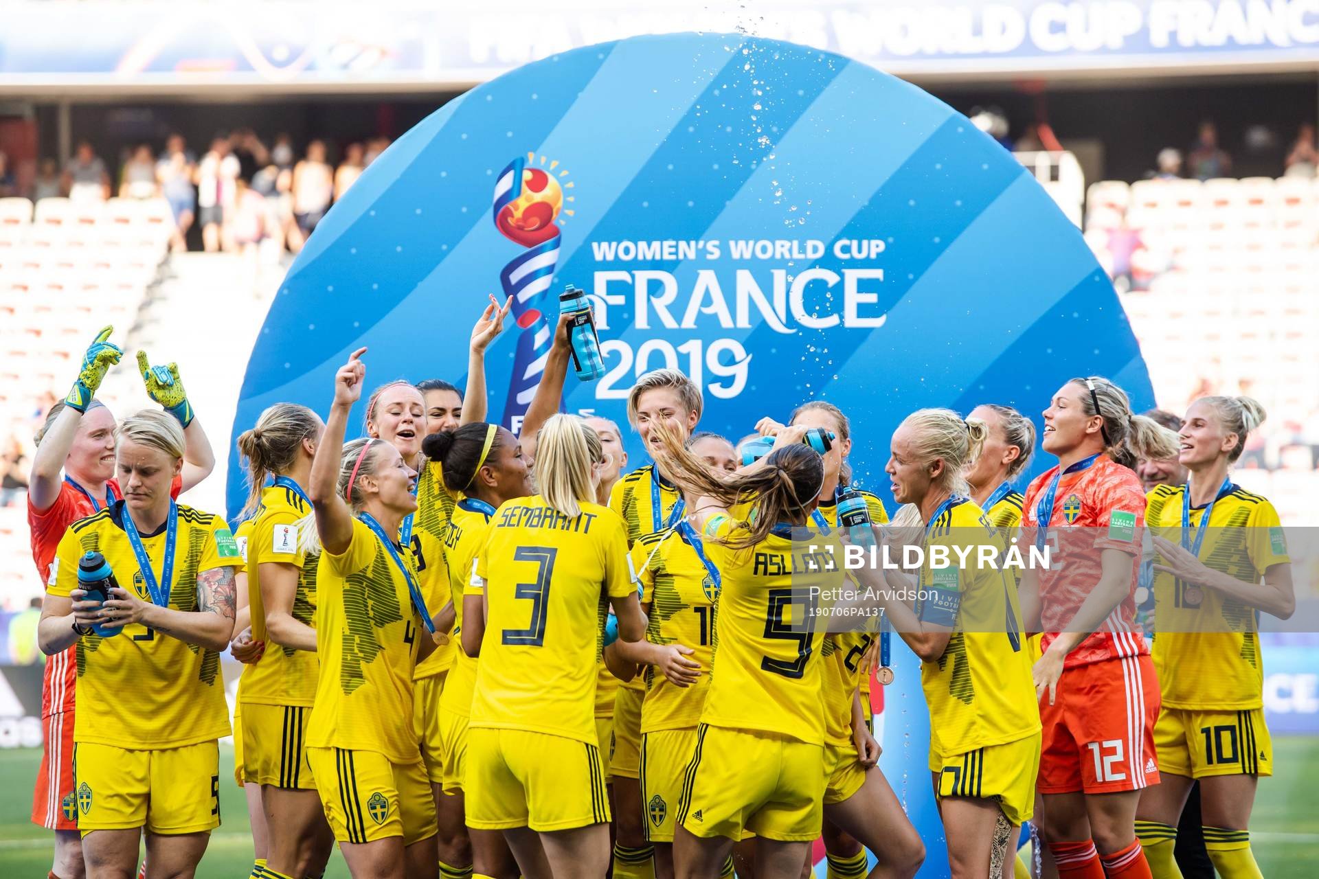 Players of Sweden celebrate with their bronze medals