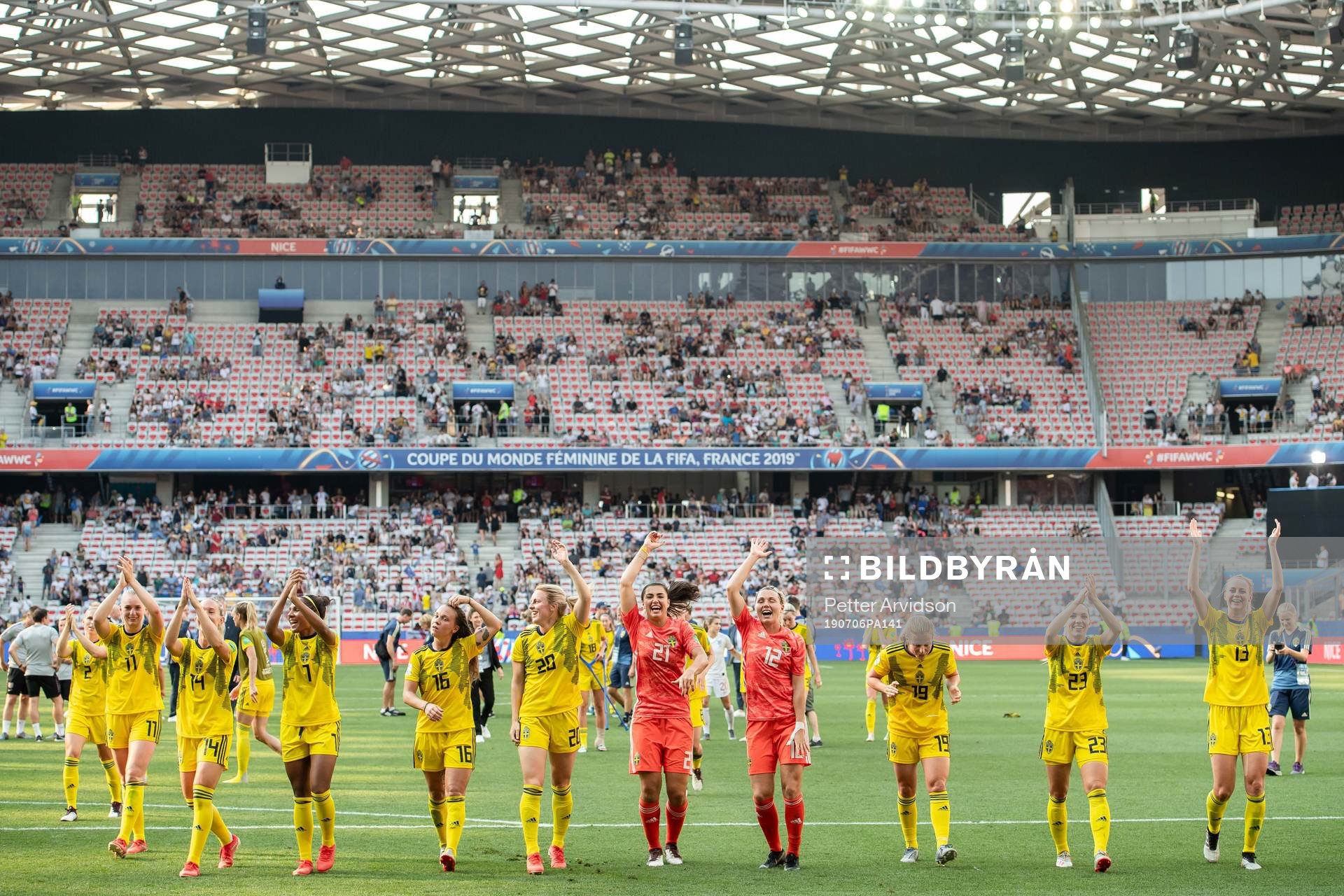 Players of Sweden celebrate winning bronze