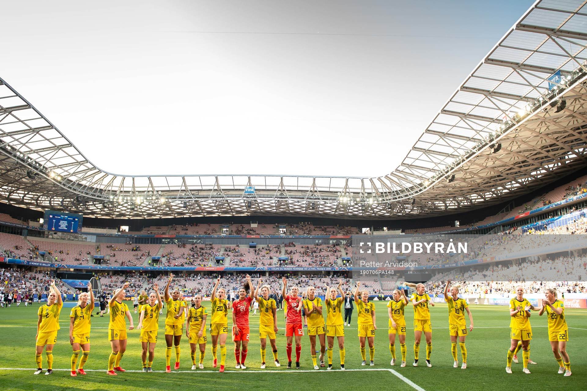 Players of Sweden celebrate winning bronze