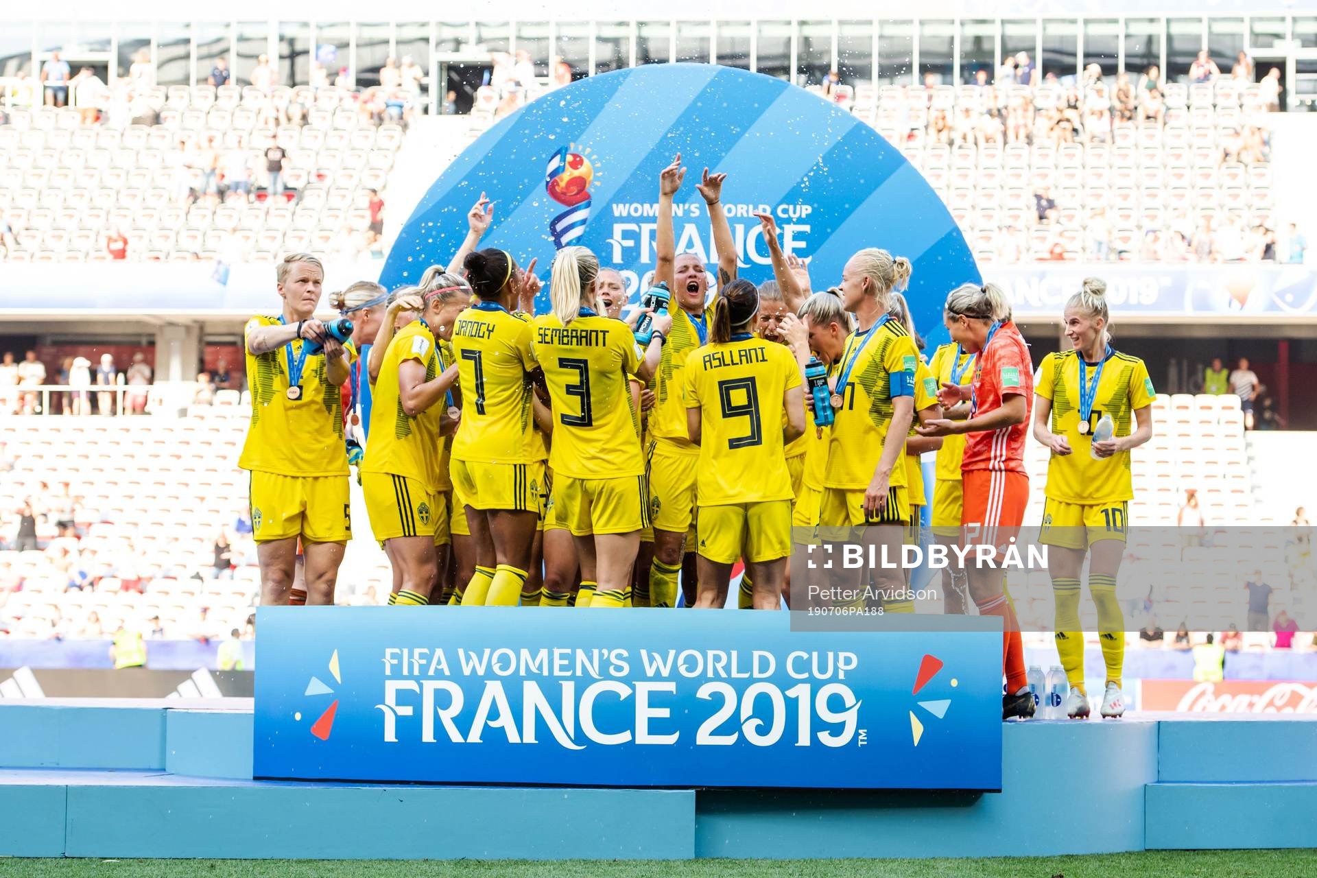 Players of Sweden celebrate with their bronze medals