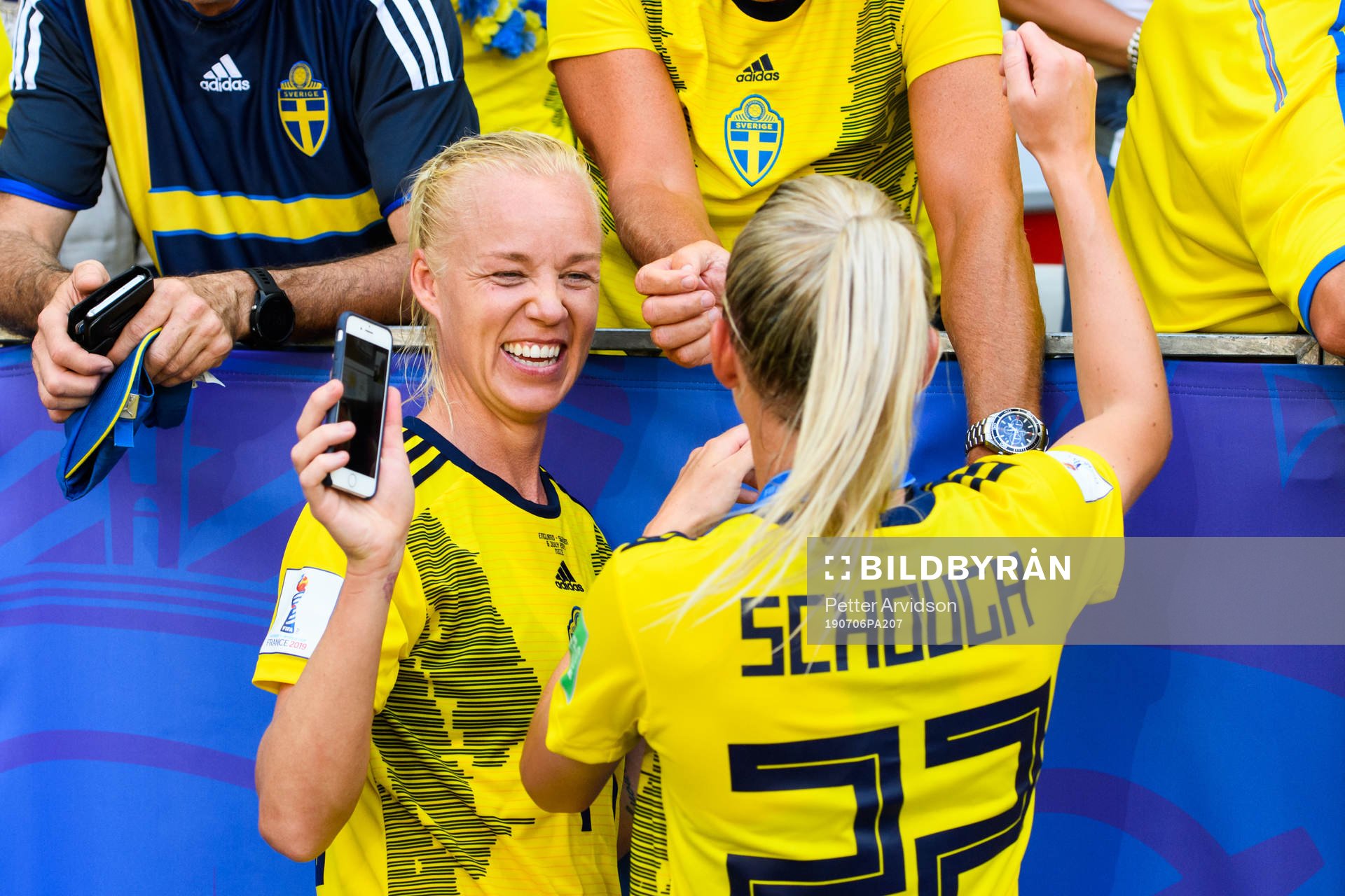 Caroline Seger and Olivia Schough of Sweden celebrate
