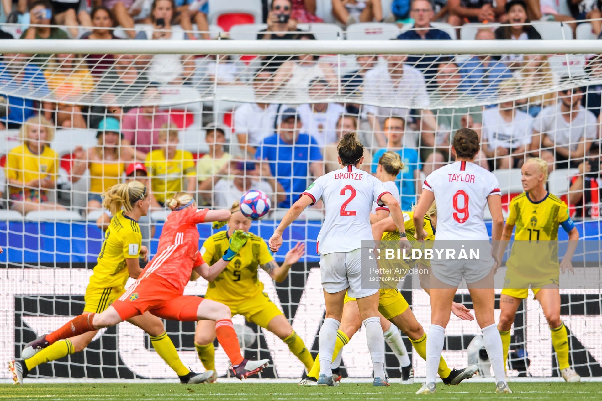 Nilla Fischer and goalkeeper Hedvig Lindahl of Sweden saves