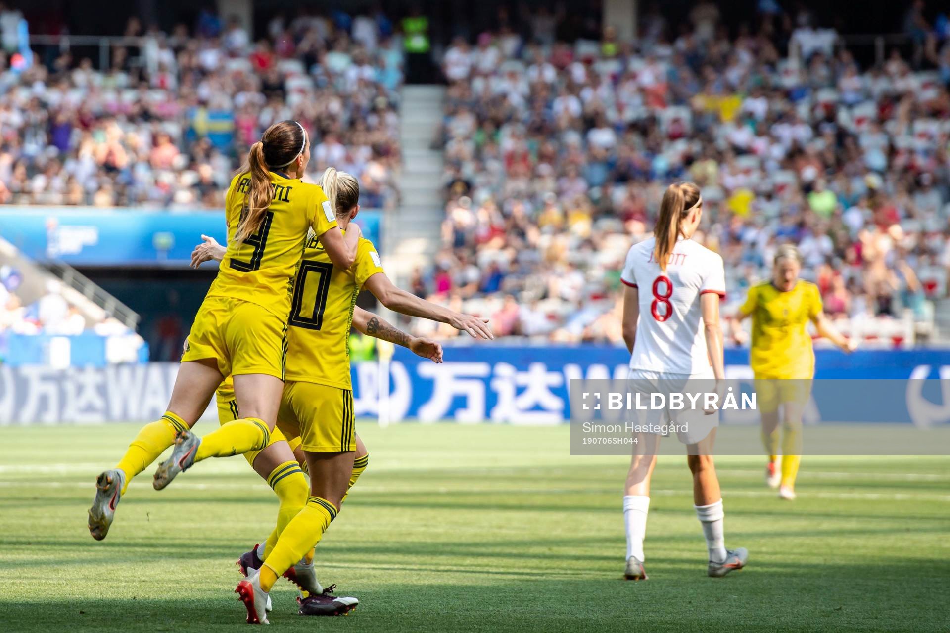 Kosovare Asllani and Sofia Jakobsson of Sweden celebrate