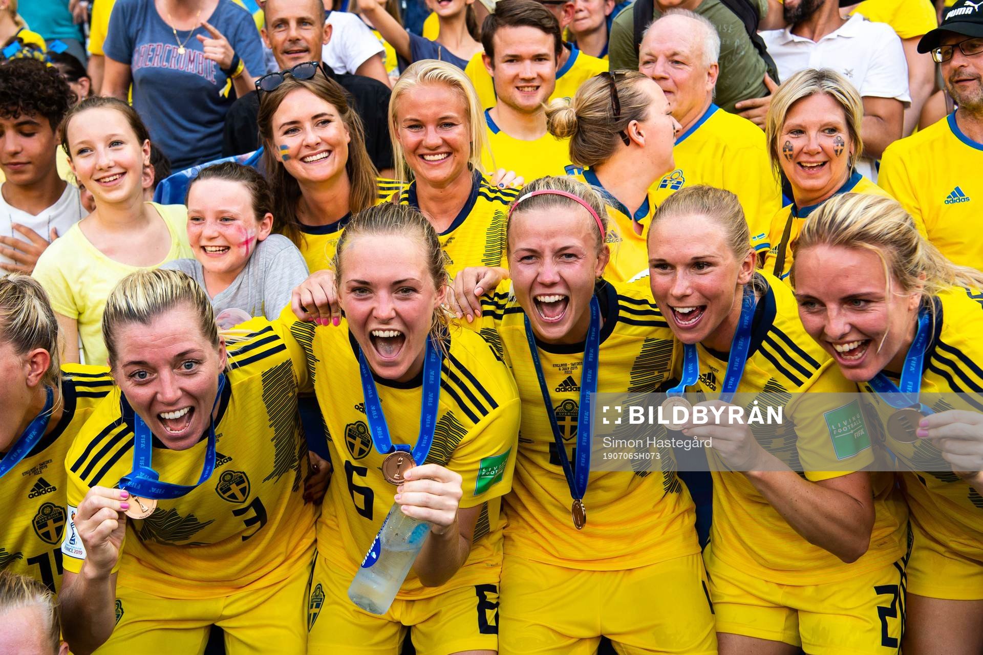 Players of Sweden celebrate with their bronze medals