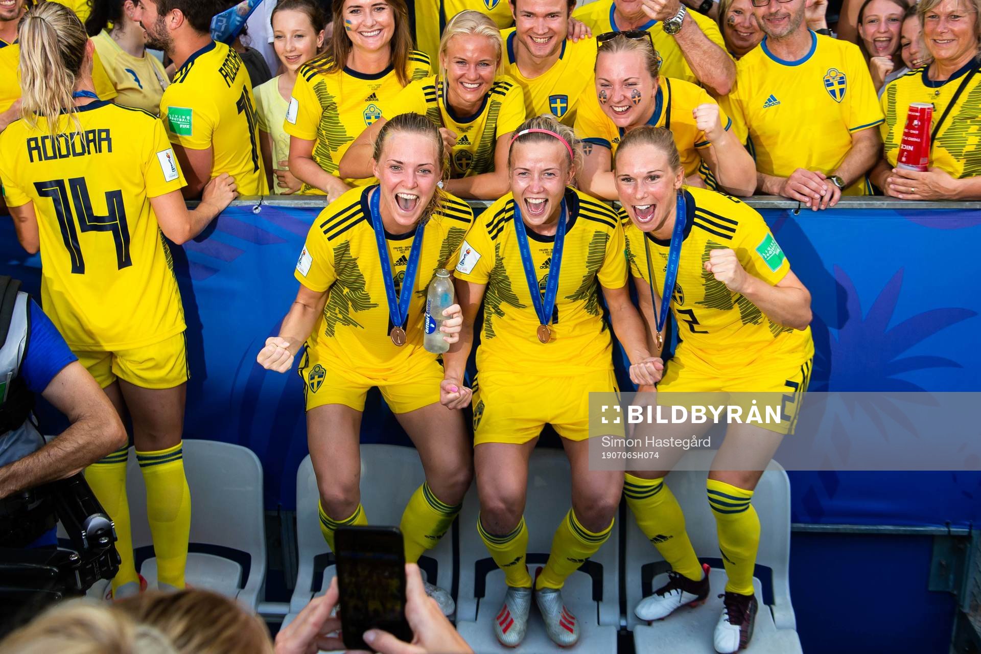 Players of Sweden celebrate with their bronze medals