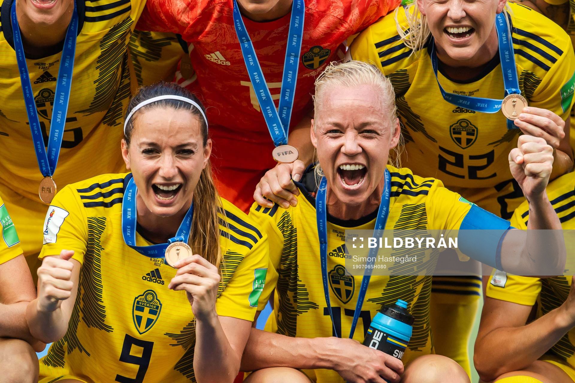 Kosovare Asllani and Caroline Seger of Sweden celebrate