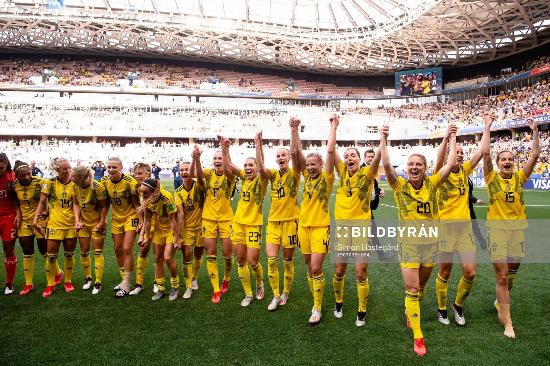 Players of Sweden celebrate winning bronze