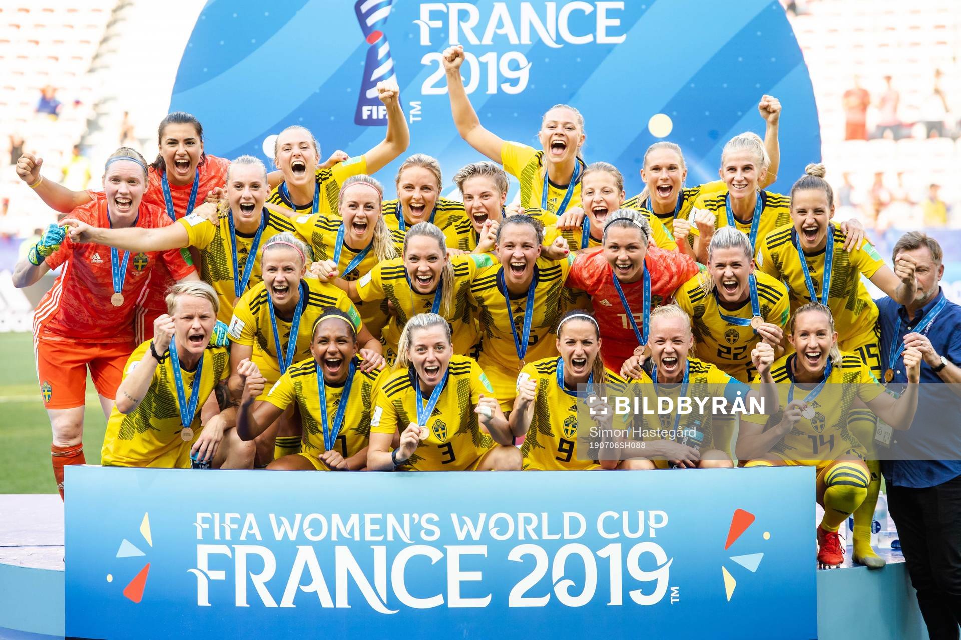 Players of Sweden celebrate with their bronze medals