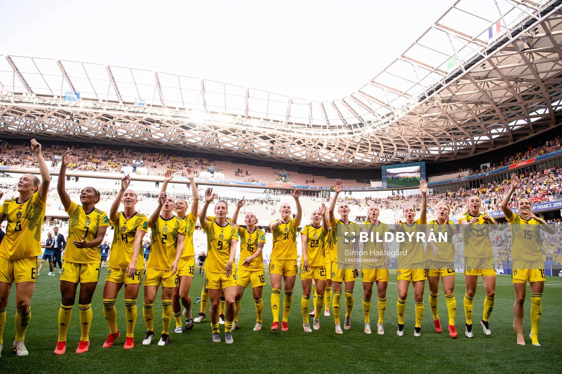 Players of Sweden celebrate winning bronze