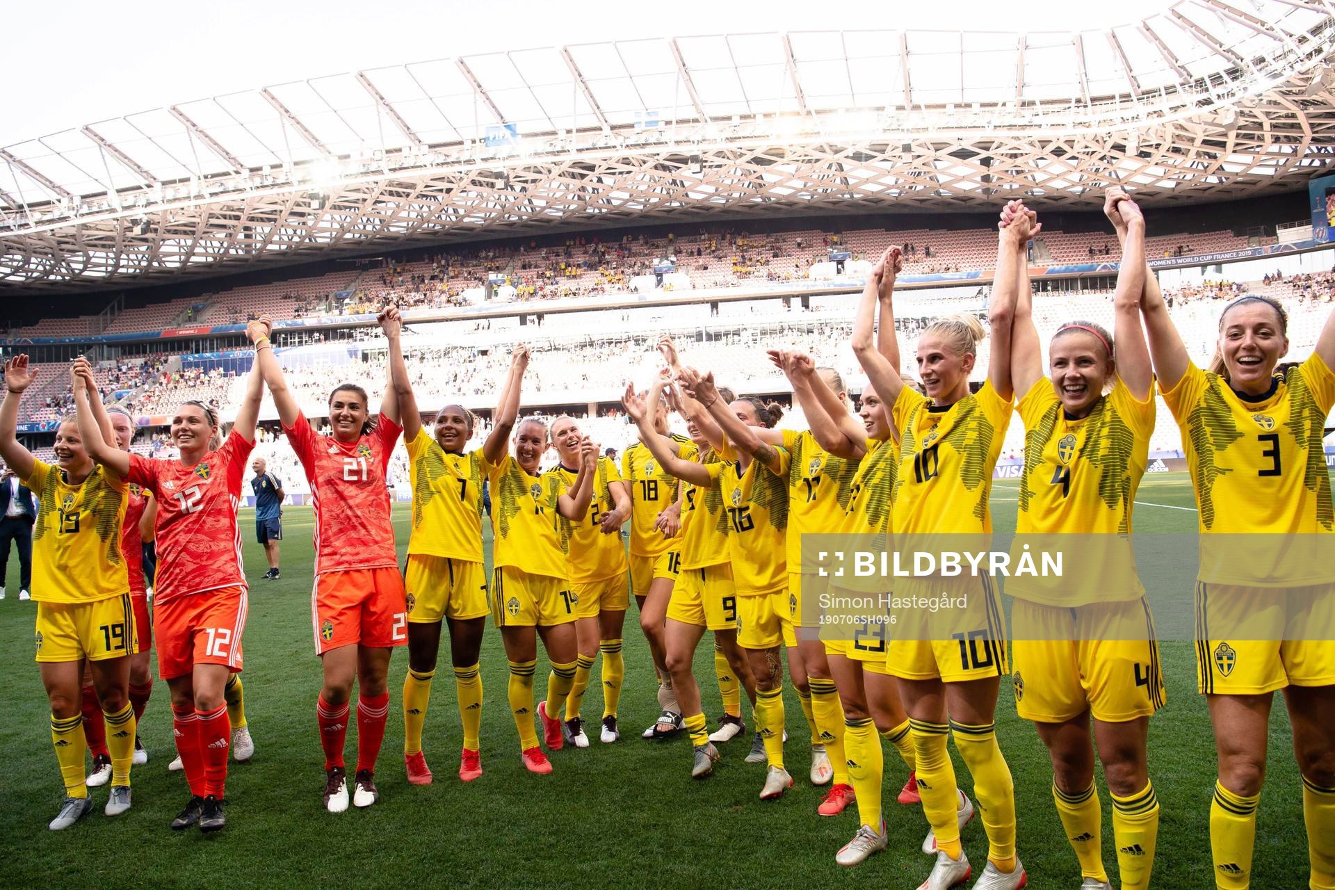 Players of Sweden celebrate winning bronze