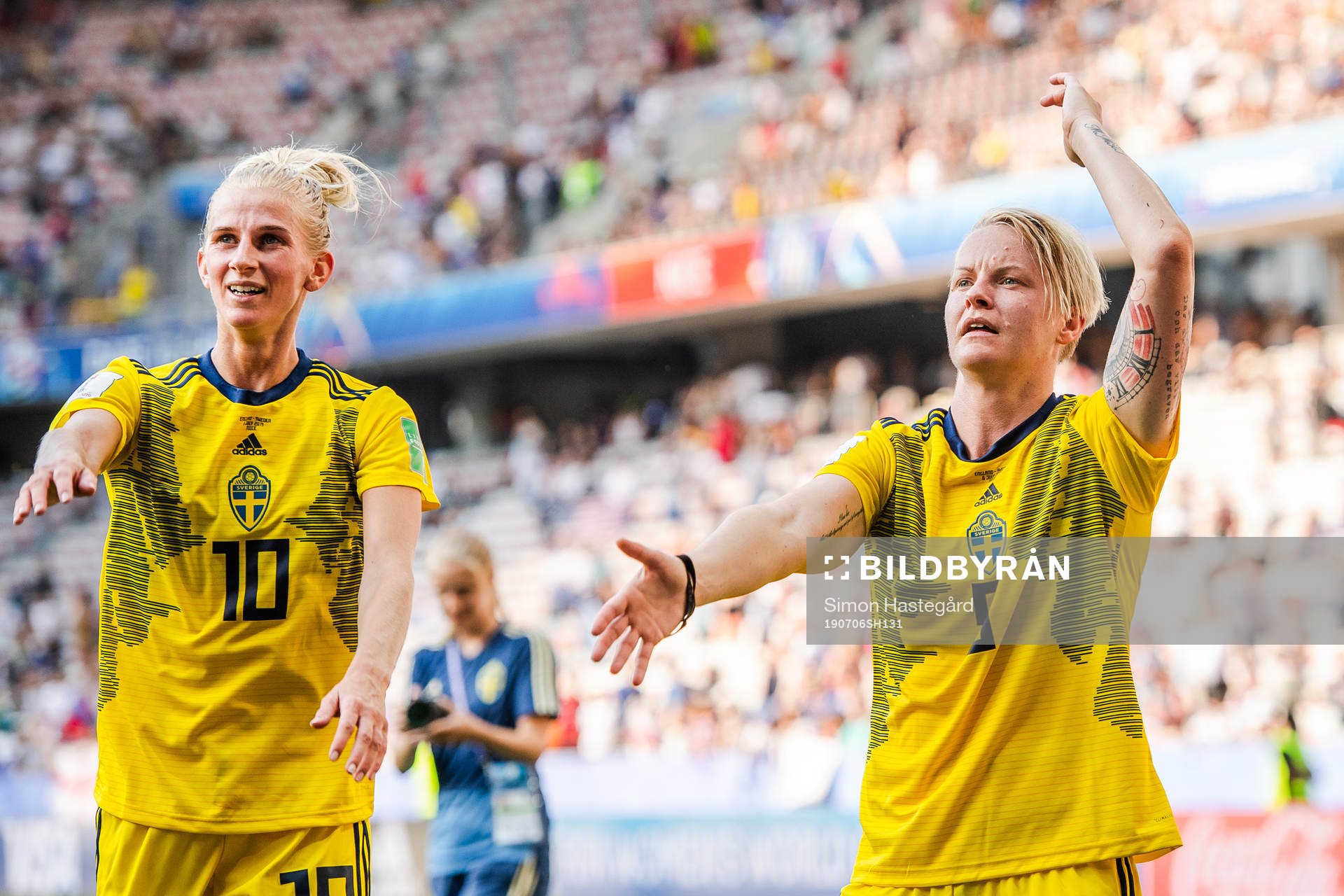 Sofia Jakobsson and Nilla Fischer of Sweden celebrate