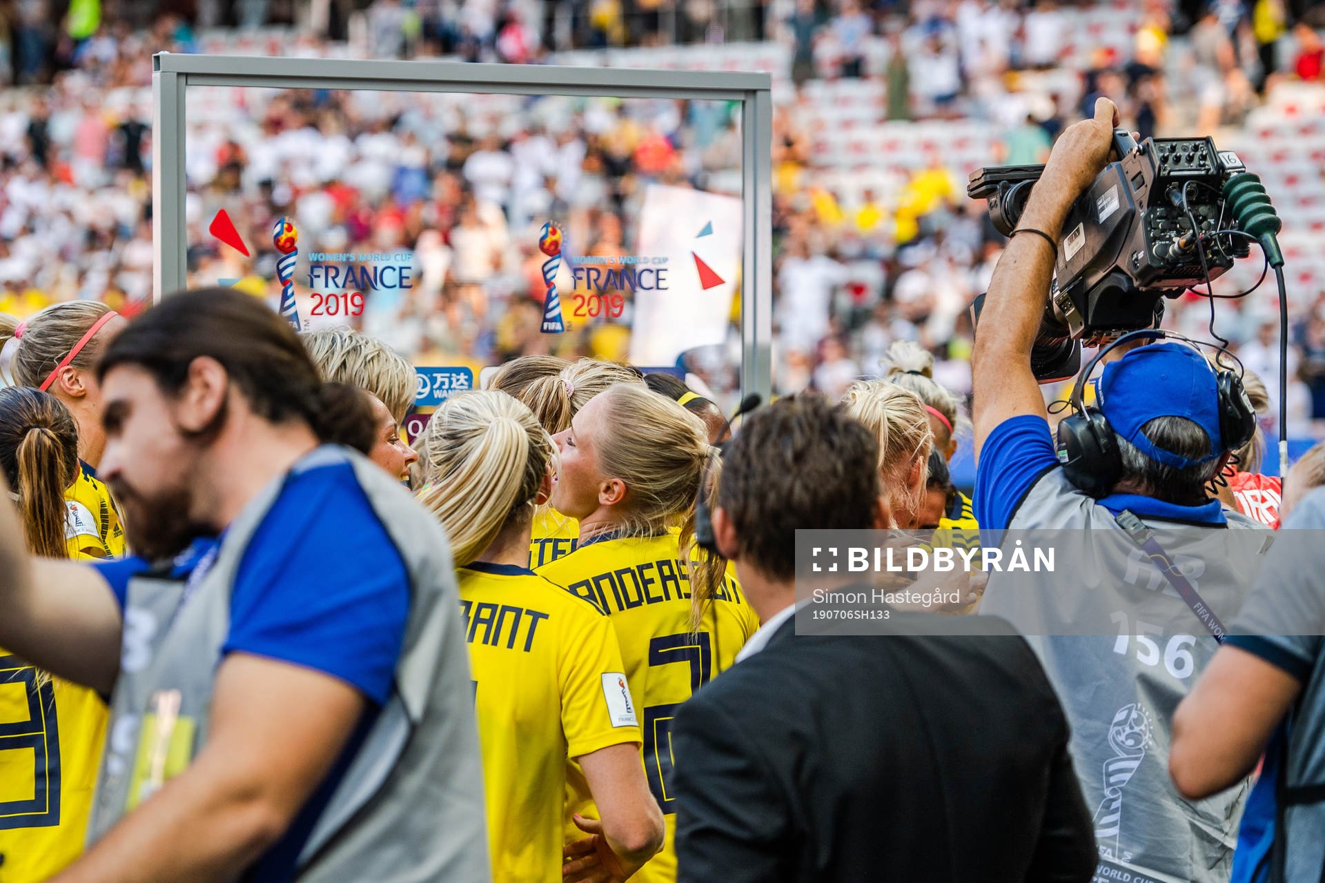 Players of Sweden celebrate with Caroline Seger , not