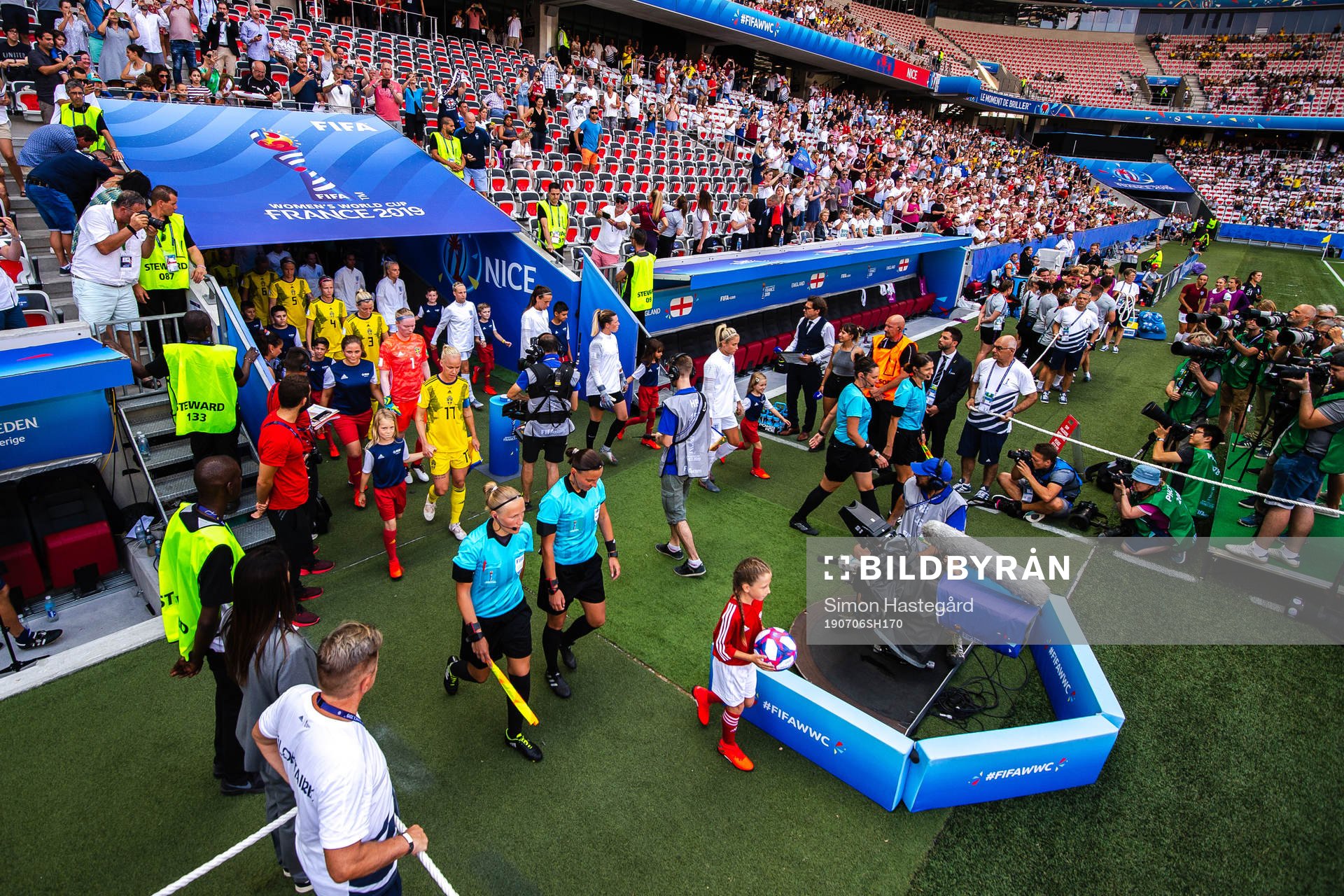 Players of Sweden and of England enters the pitch