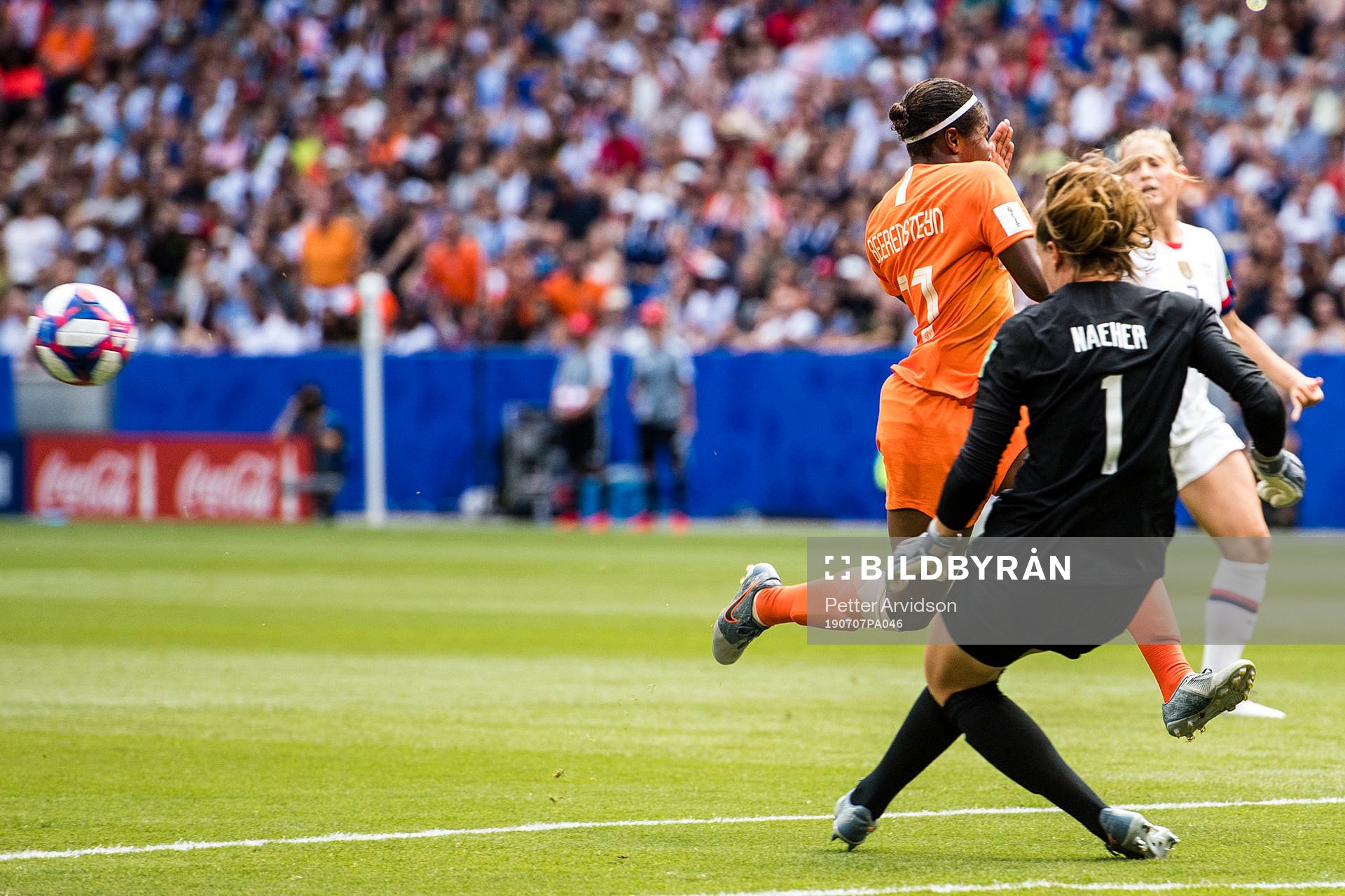 Goalkeeper Alyssa Naeher of USA and Lineth Enid Fabienne