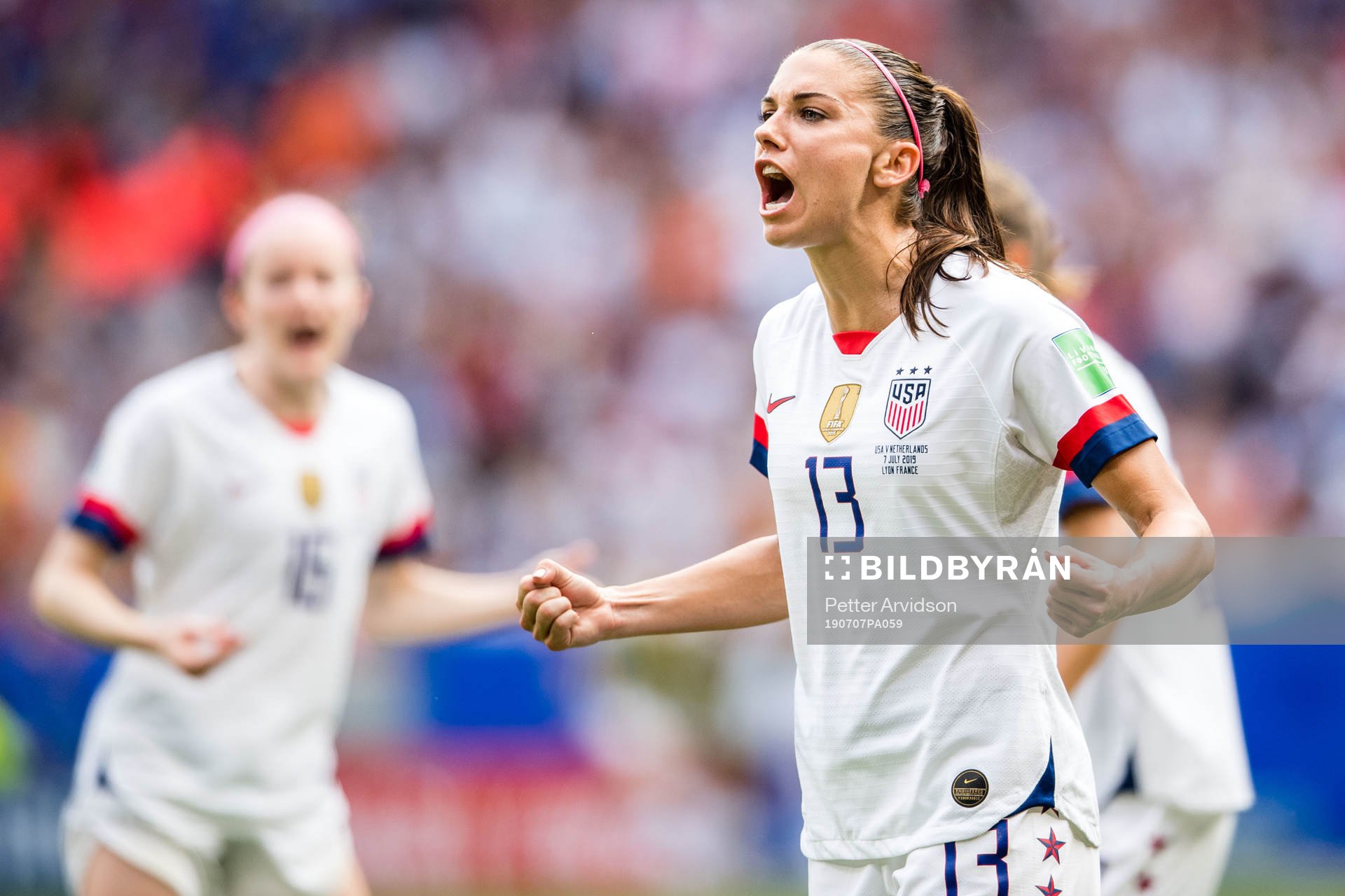Alex Morgan of USA celebrates