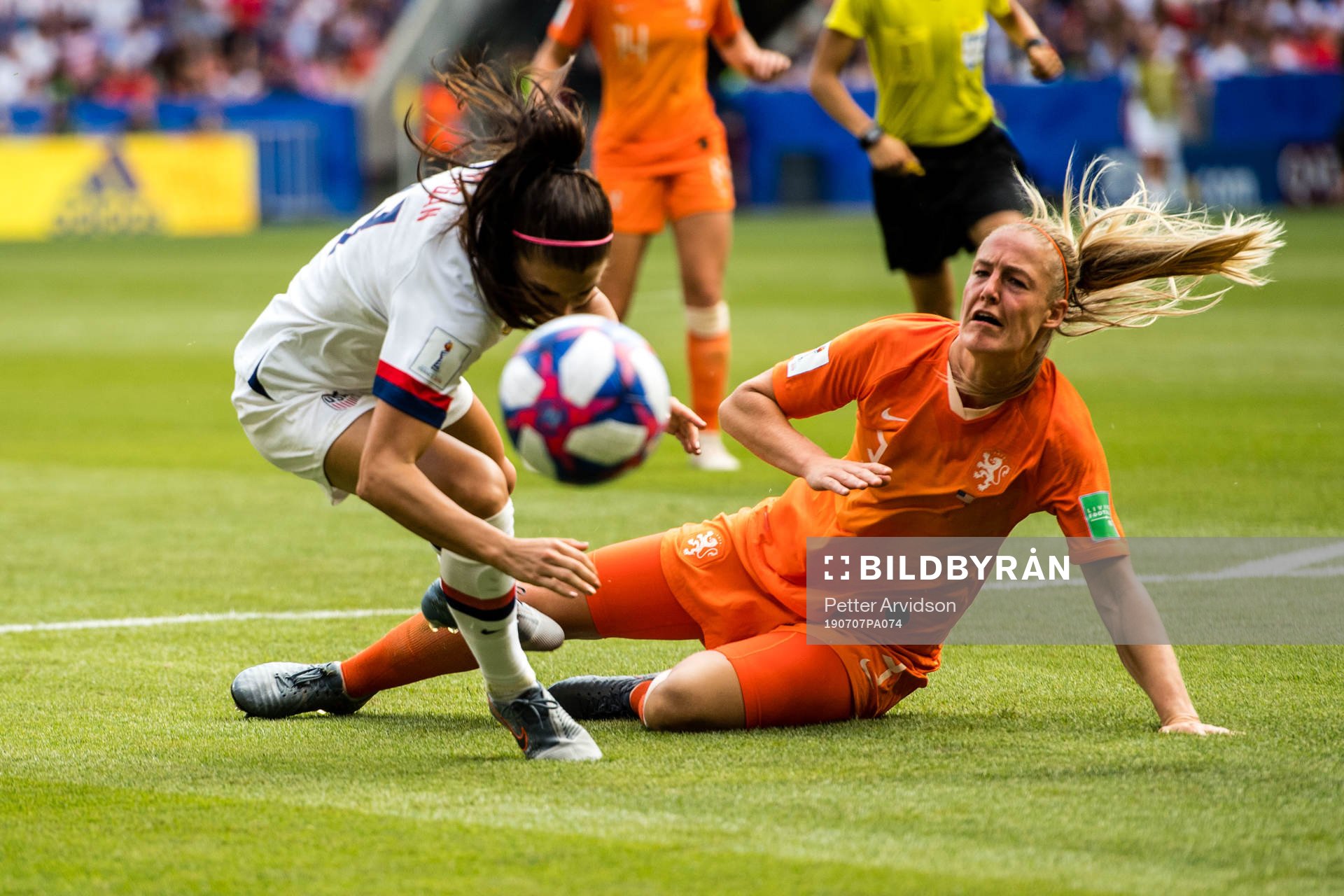 Stefanie Van Der Gragt of Netherlands and Alex Morgan of USA