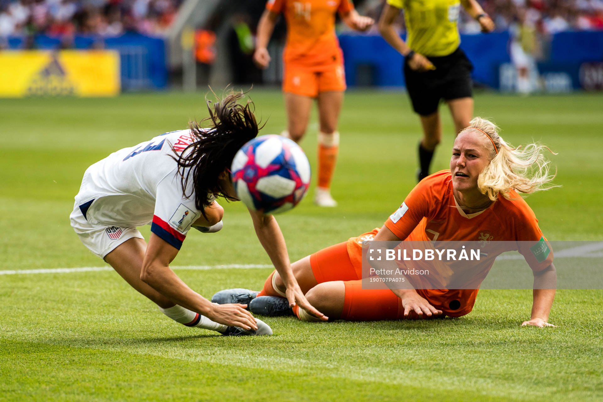 Stefanie Van Der Gragt of Netherlands and Alex Morgan of USA