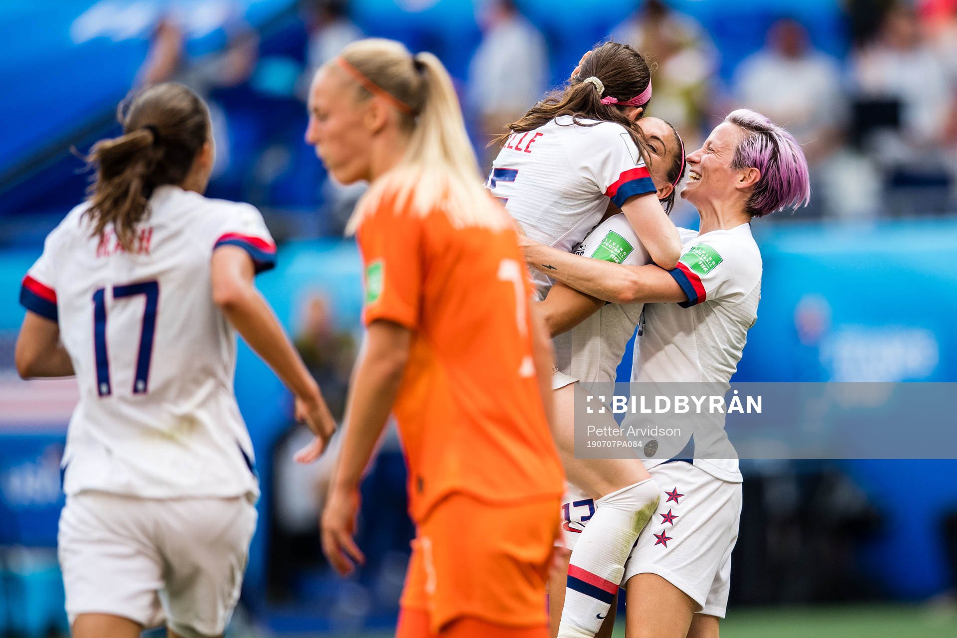 Alex Morgan, Megan Rapinoe and Rose Lavelle celebrates 2-0