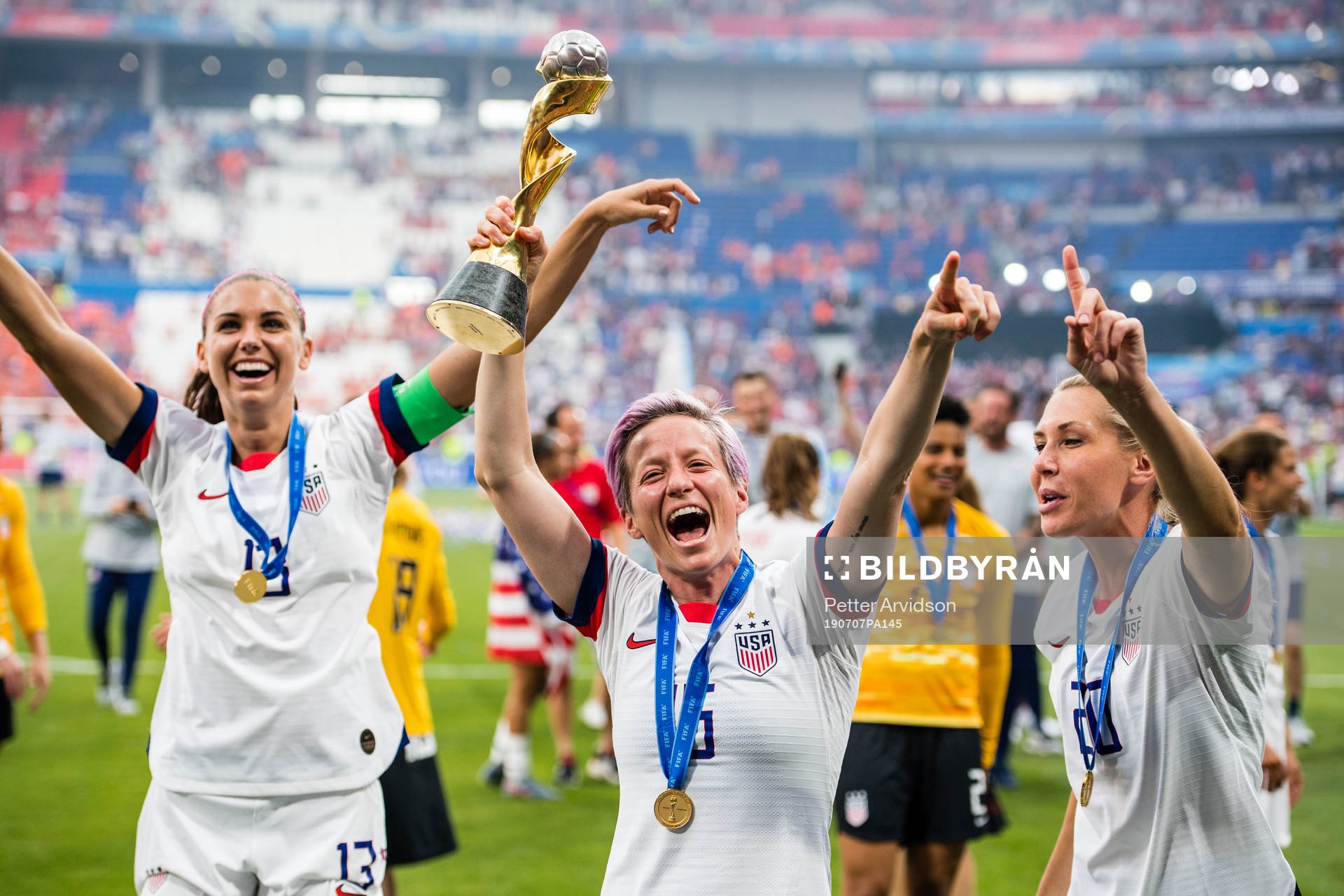 Alex Morgan, Megan Rapinoe and Alexandra Long  of USA