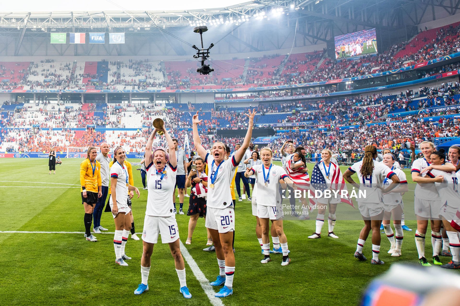 Megan Rapinoe and Alexandra Long  of USA celebrates