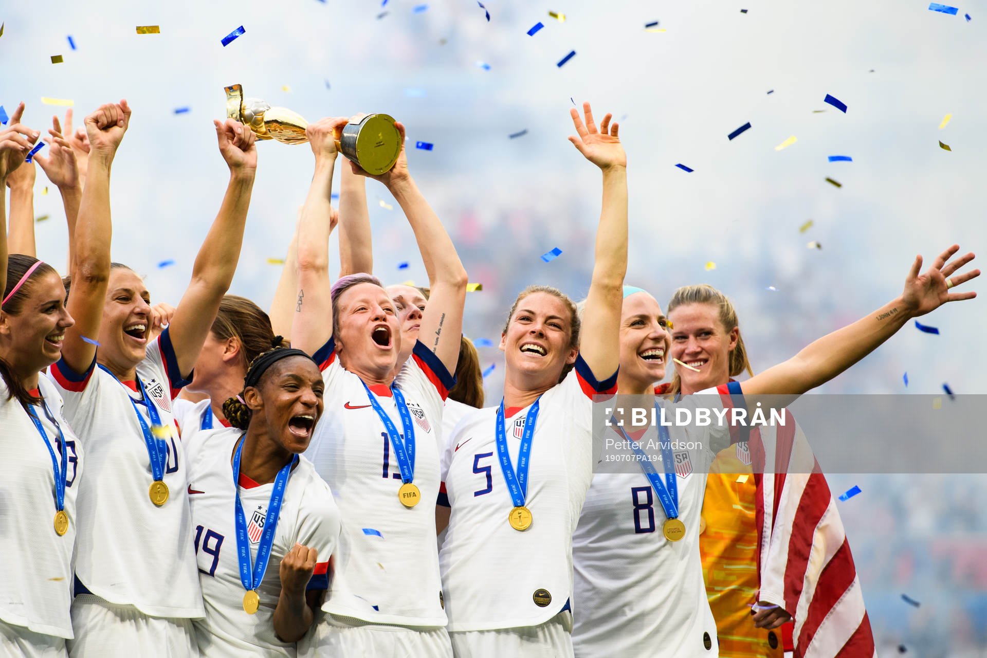 Megan Rapinoe of USA celebrate with the trophy