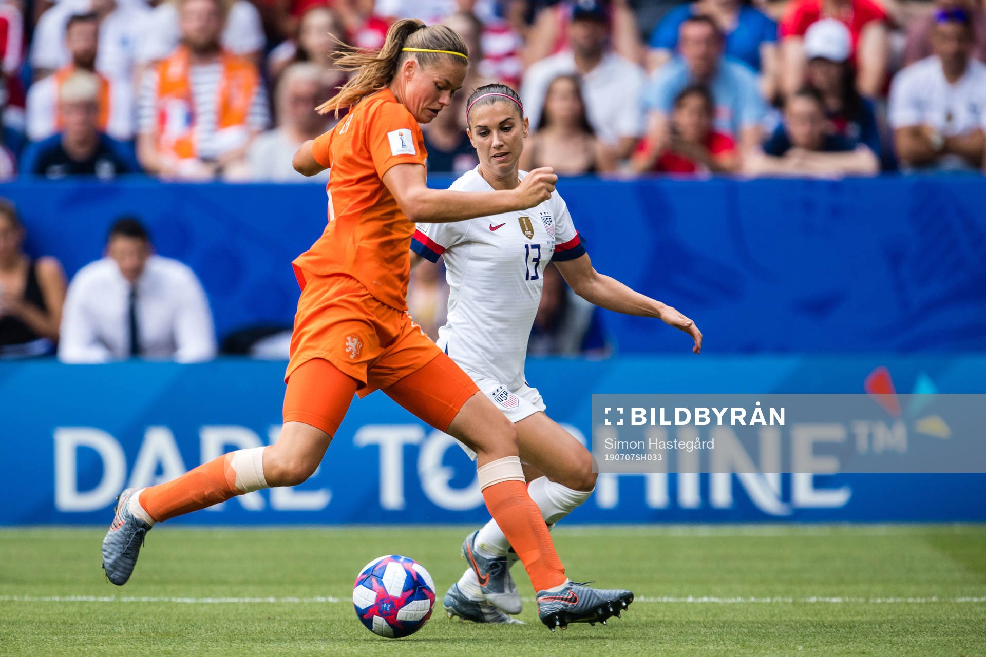 Manieke Anouk Dekker of Netherlands and Alex Morgan of USA