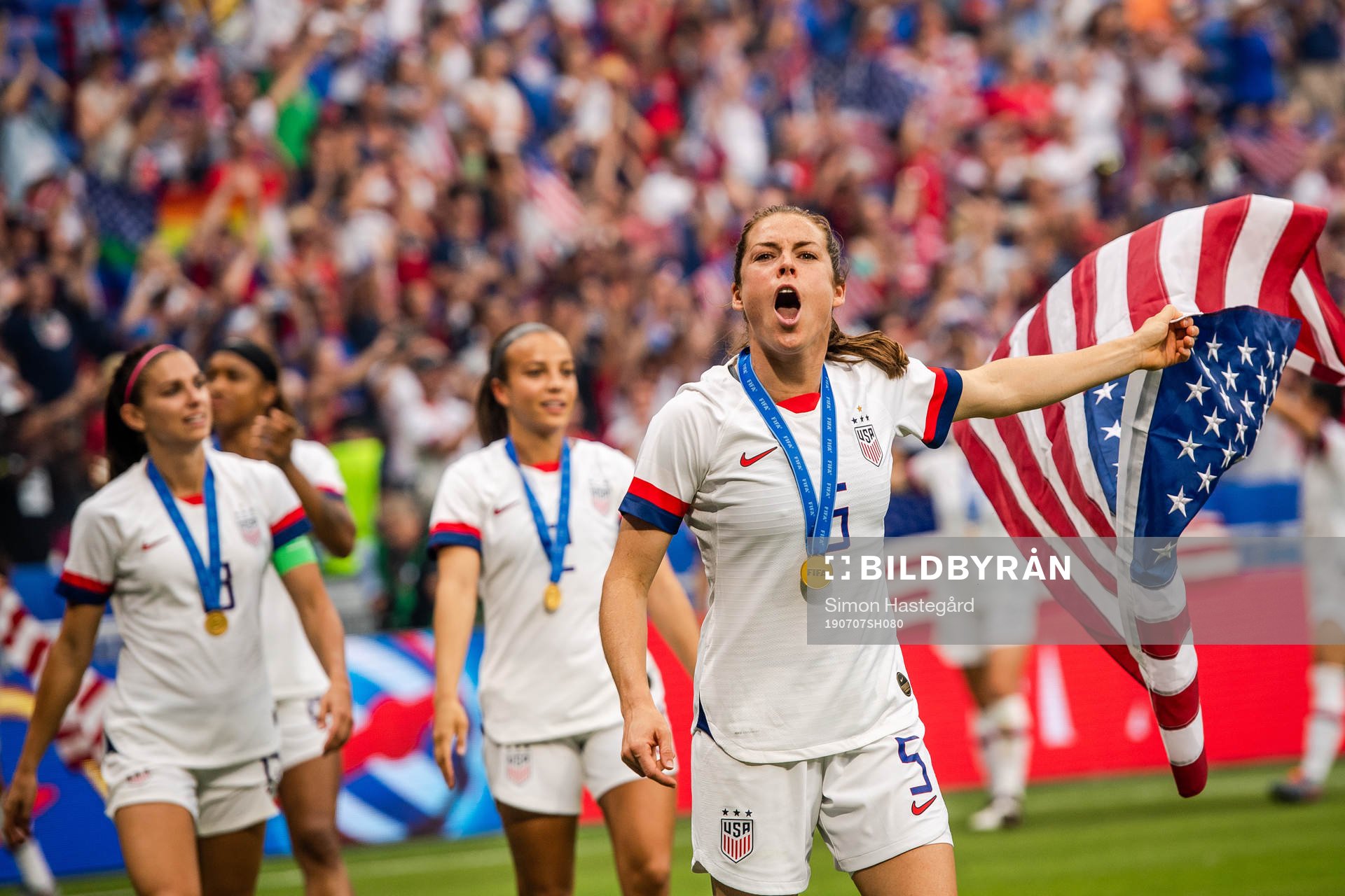 Kelley O'Hara of USA celebrates