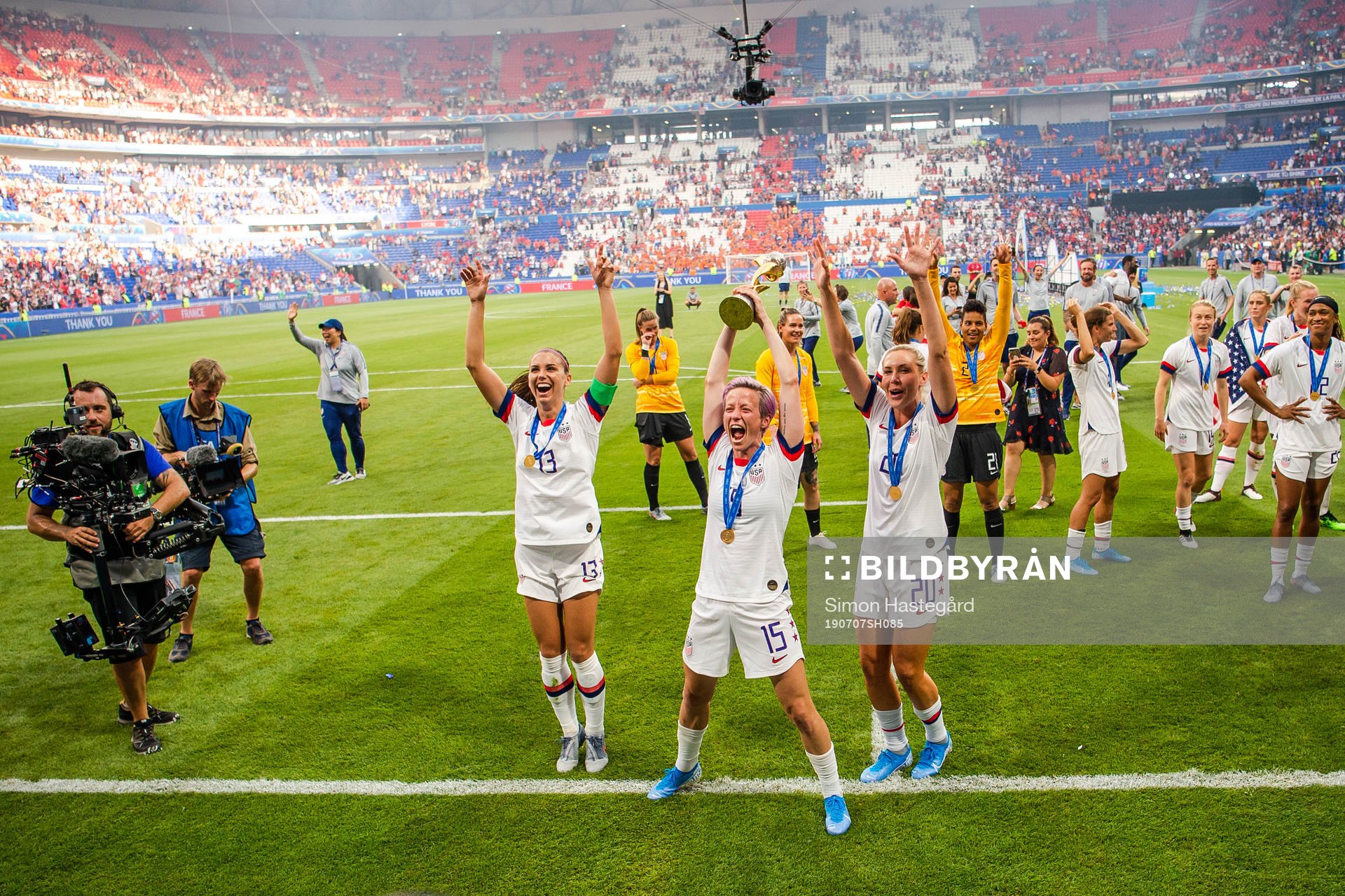 Alex Morgan , Megan Rapinoe and Alexandra Long of USA