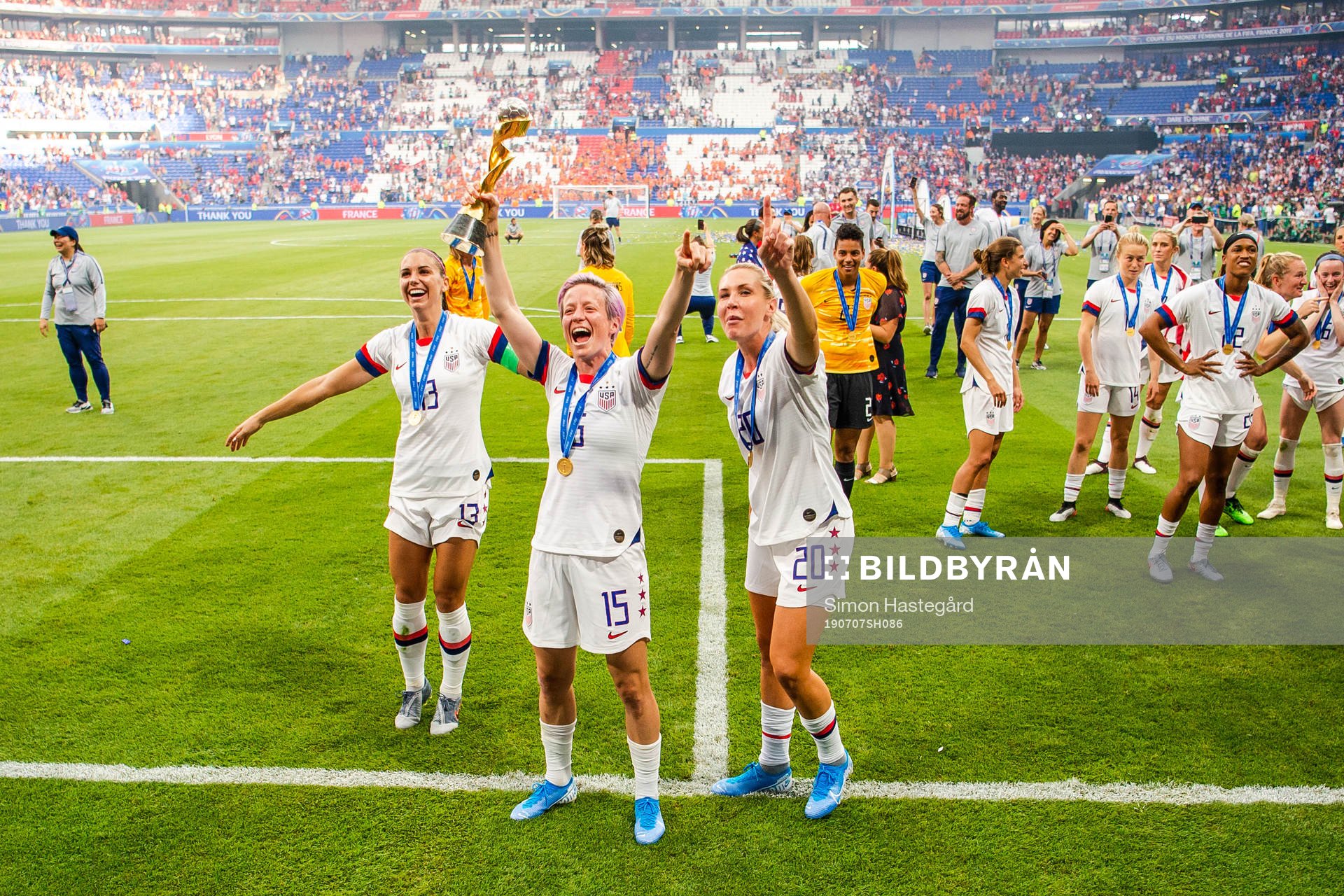 Alex Morgan , Megan Rapinoe and Alexandra Long of USA