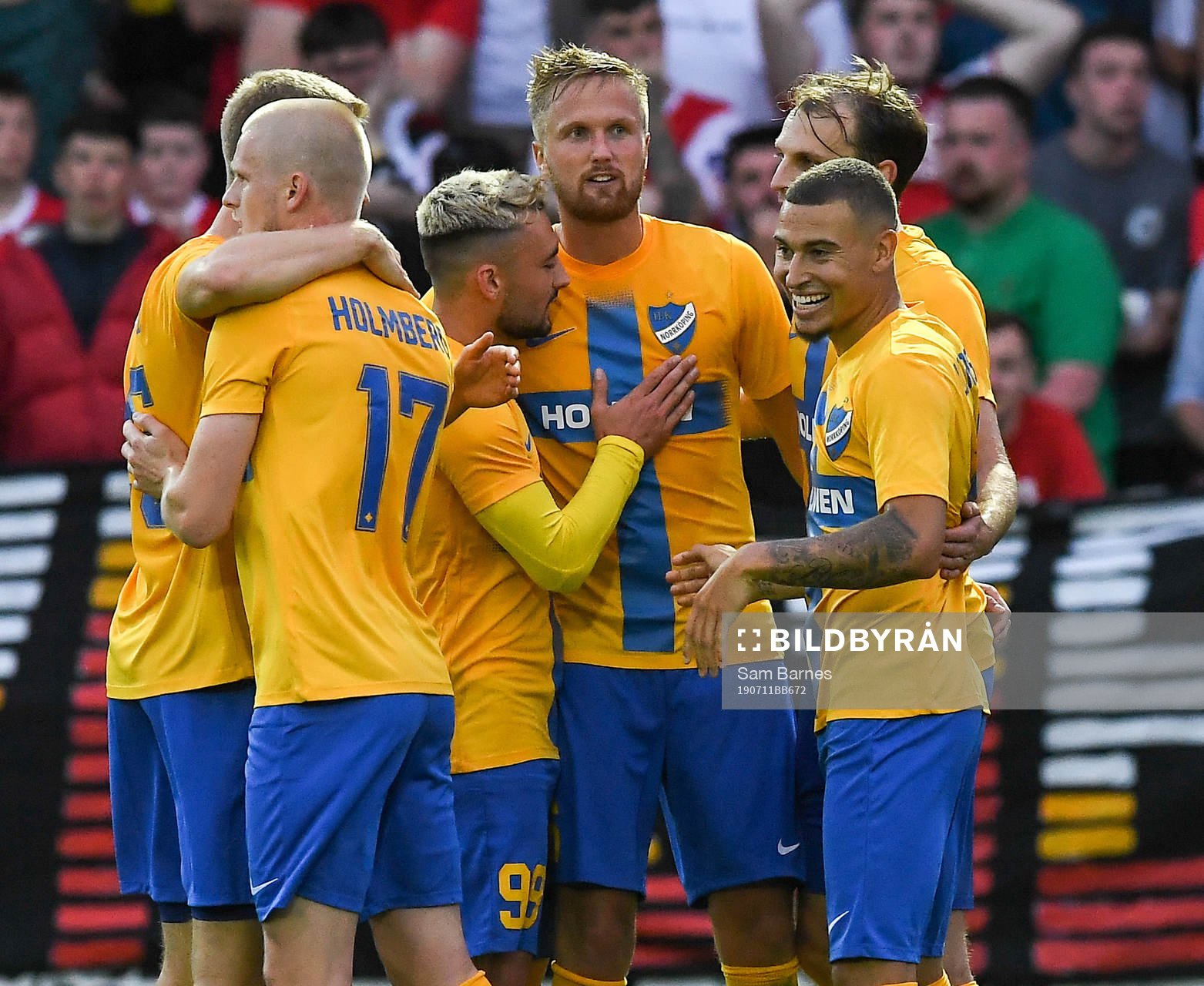 Kasper Larsen,centre, of IFK Norrköping is congratulated