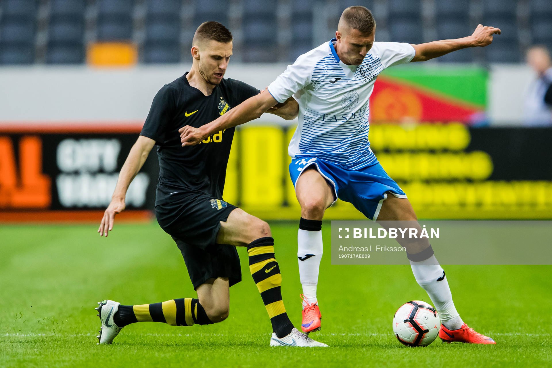 Karol Mets of AIK and Anton Kobyalko of Ararat-Armenia during the UEFA Champions League qualifying match between AIK and Ararat-Armenia on July 17, 2019 in Stockholm.