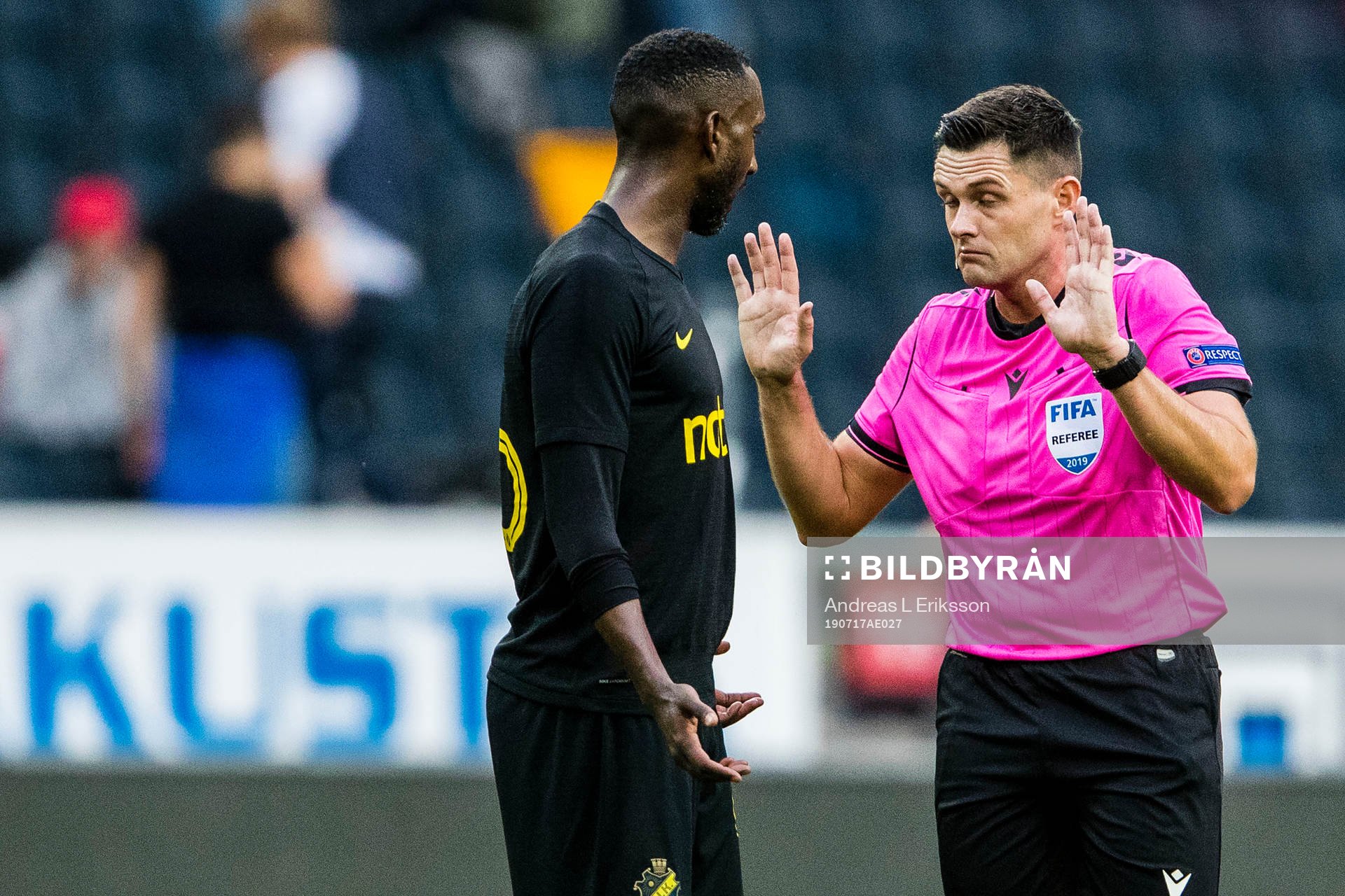 Henok Goitom of AIK and referee Robert Hennessy