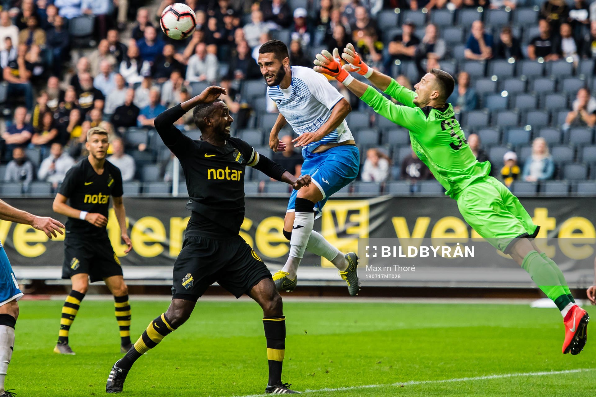 Henok Goitom of AIK and goalkeeper Dmitri Abakumov of