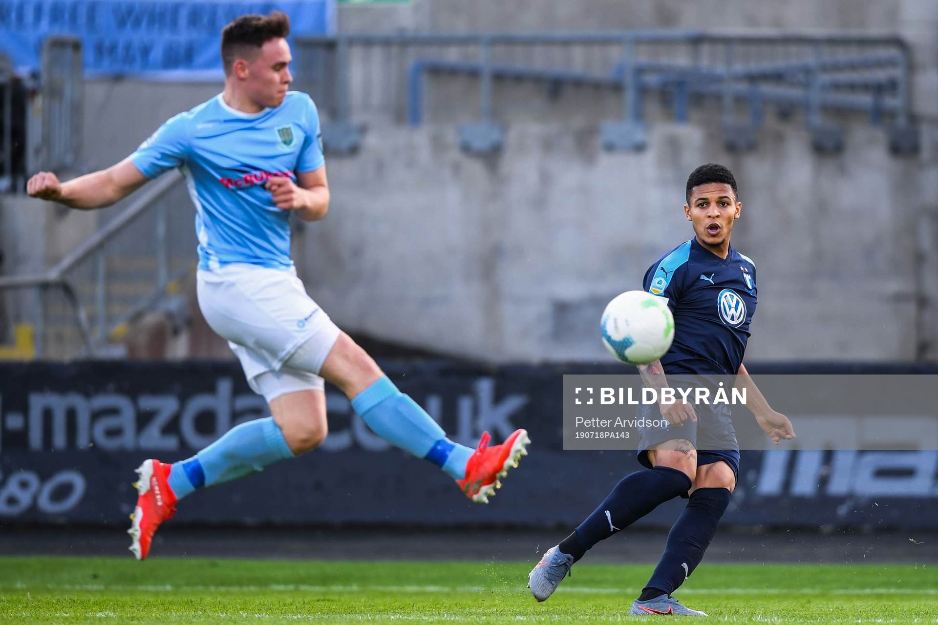 Andrew Burns of Ballymena United and Romain Gall of Malmö