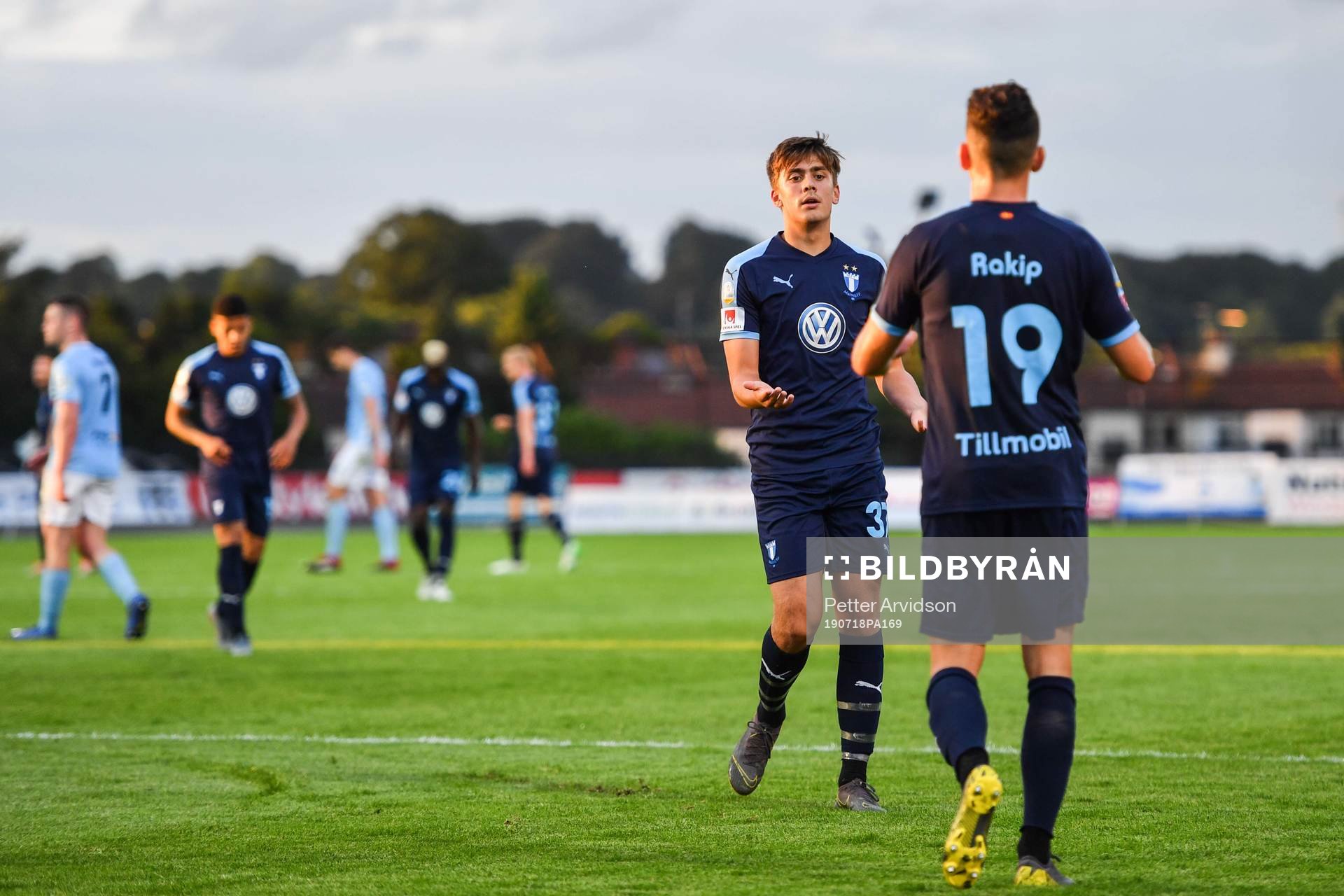 Erdal Rakip and Tim Prica of Malmö FF celebrate after 0-3 during the UEFA Europa League qualifying match between Ballymena United and Malmö FF on July 18, 2019 in Ballymena.