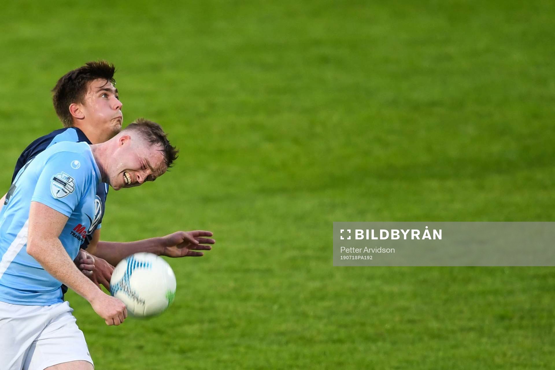 Tim Prica of Malmö FF and Andrew Burns of Ballymena United