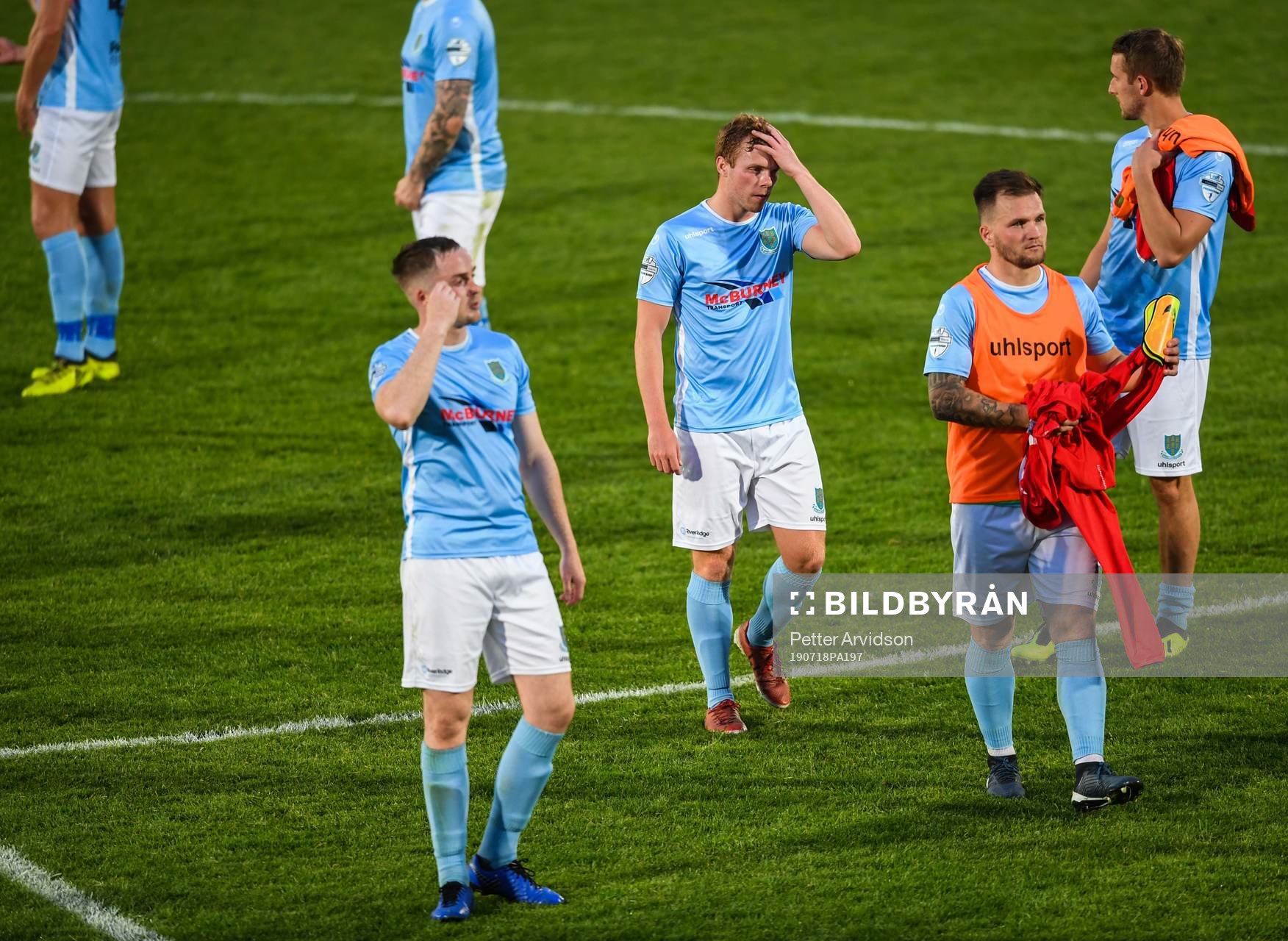 Players of Ballymena United look dejected