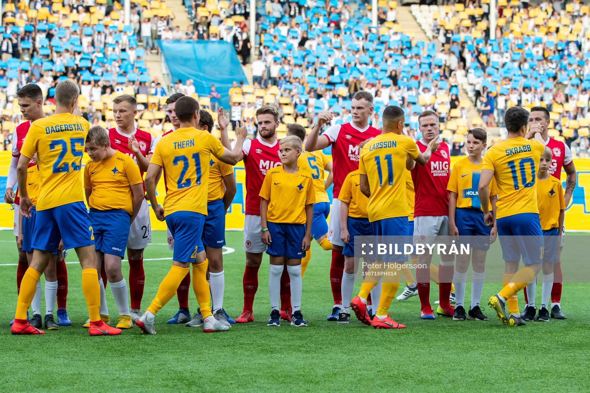 The players greet each other