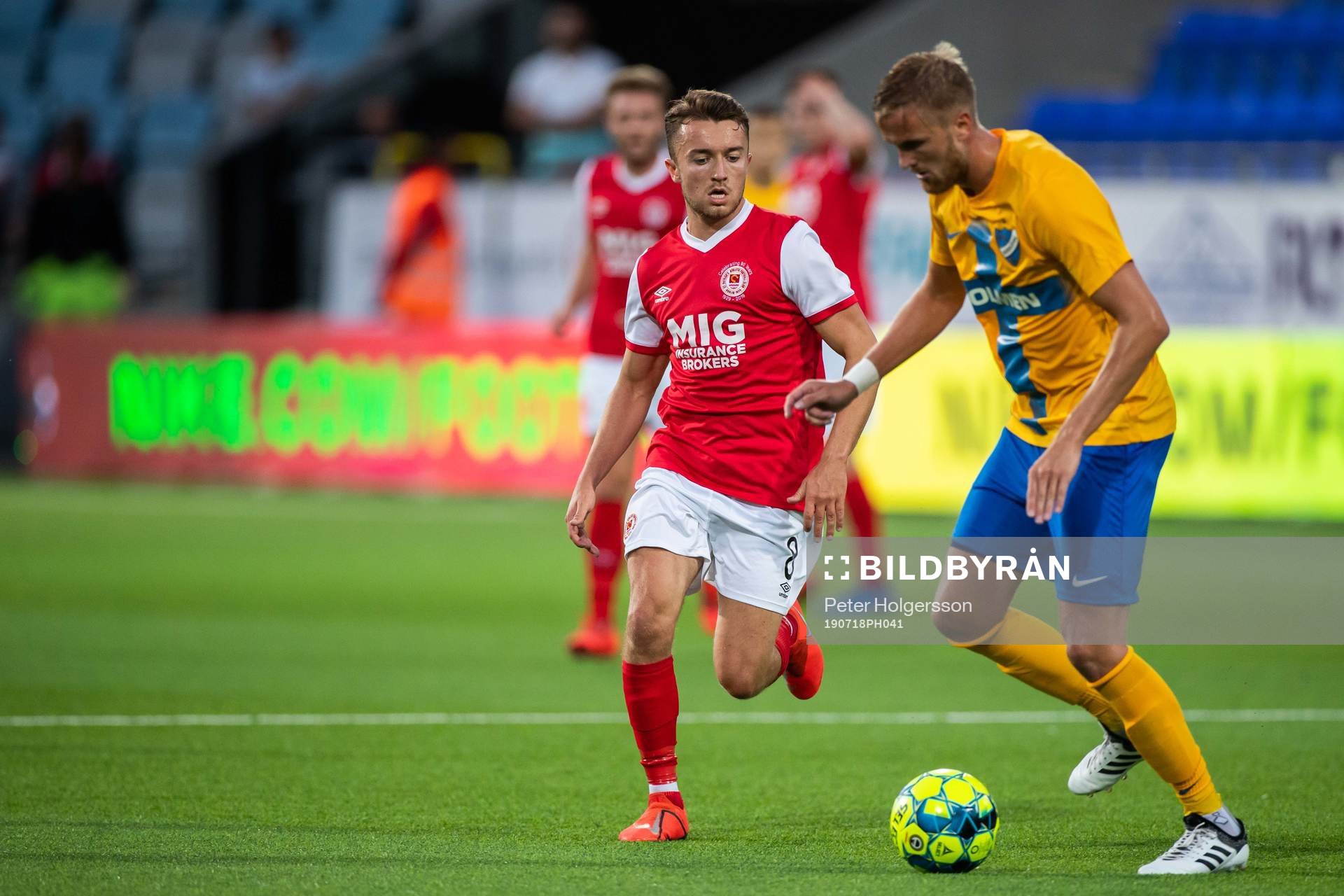 Darragh Markey of St Patrick's and Kasper Larsen of IFK