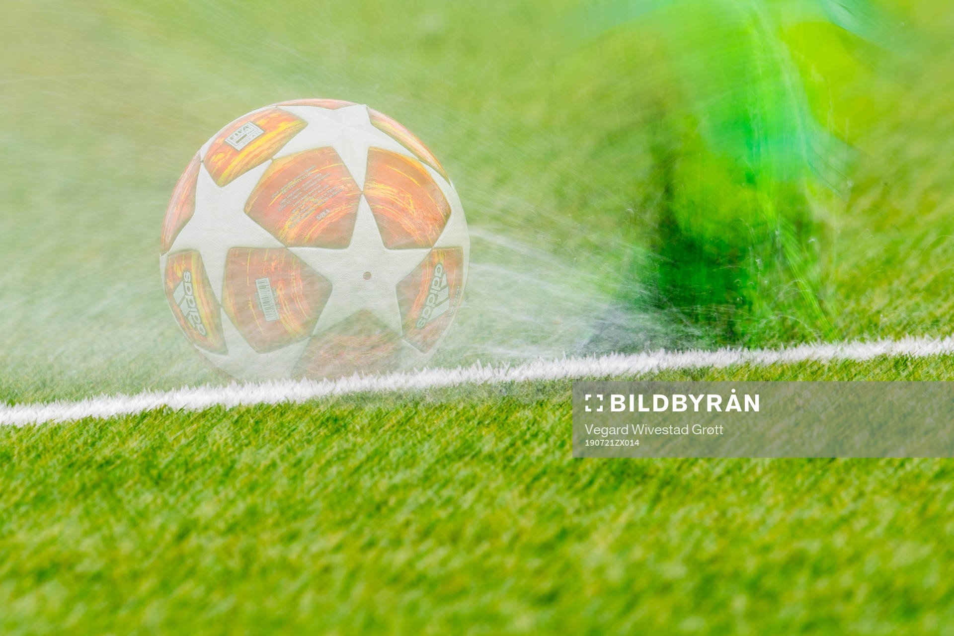 The Adidas match ball is being kicked