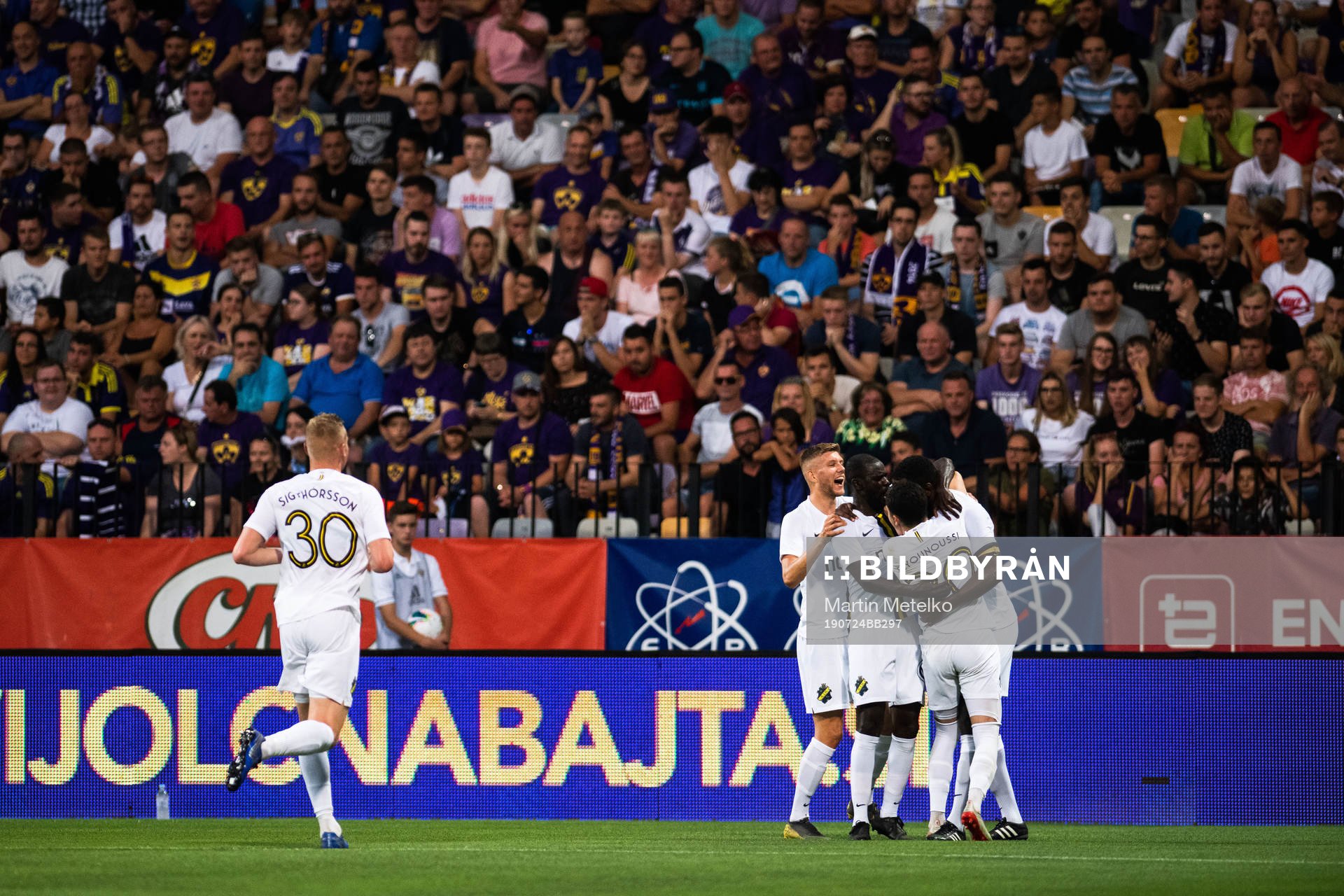 Henok Goitom of AIK celebrate with team mates