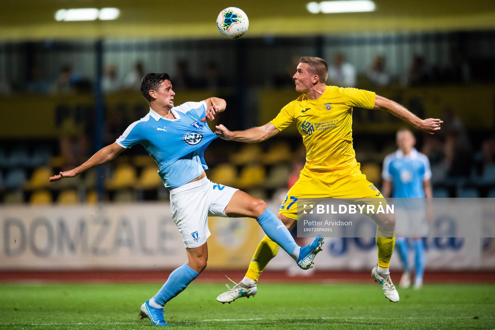 Marcus Antonsson of Malmö FF andGaber Dobrovoljc of Domzale