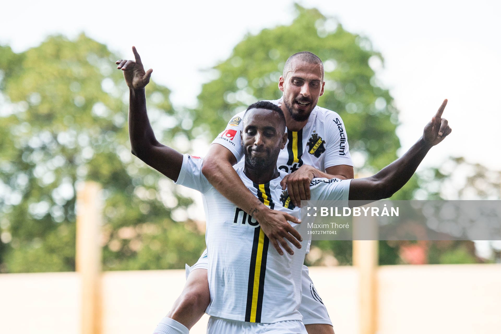 AIK:s Henok Goitom och Panajotis Dimitriadis jublar efter 0-2 under fotbollsmatchen i Allsvenskan mellan Sirius och AIK den 27 juli 2019 i Uppsala.