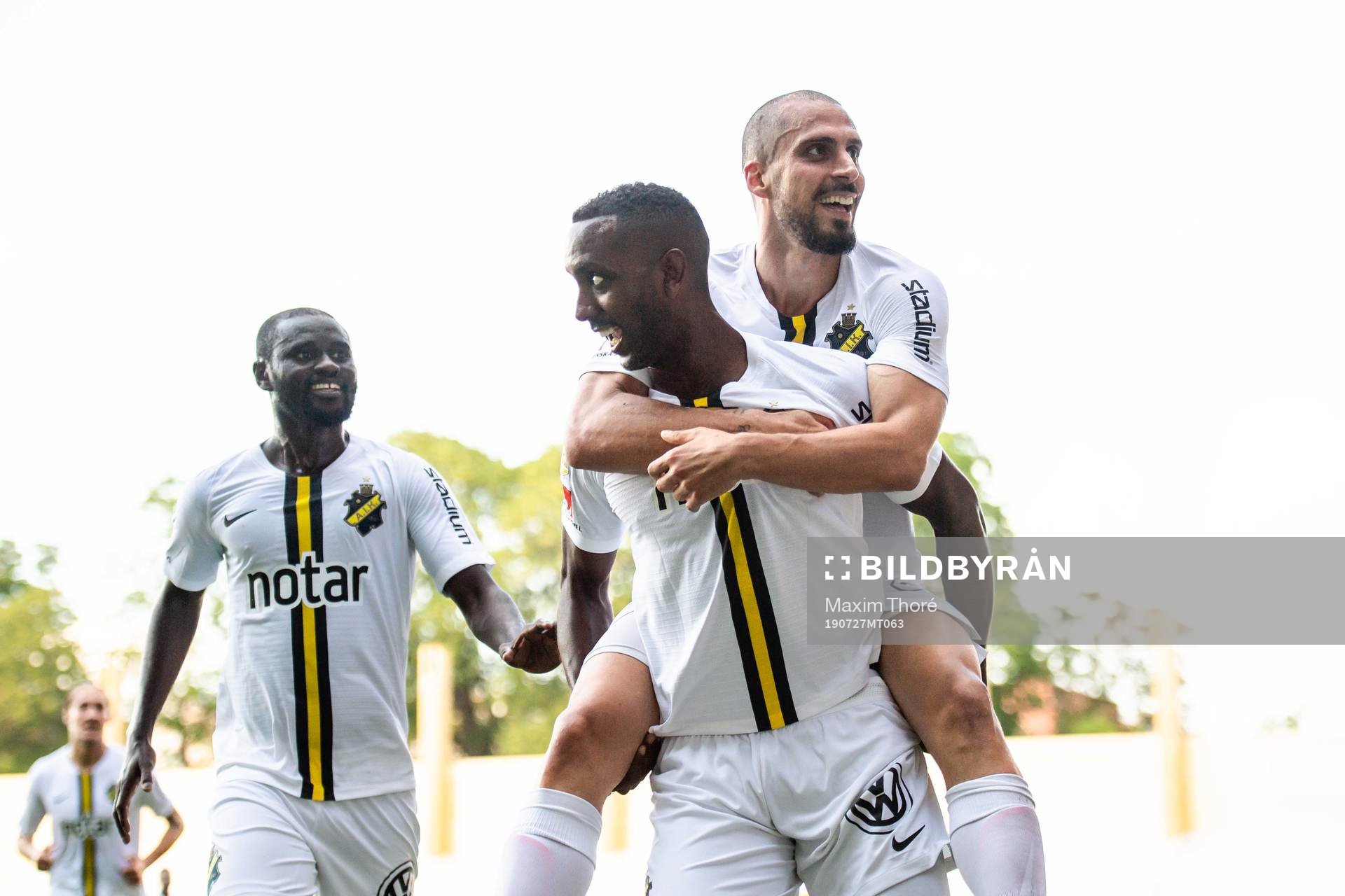 AIK:s Panajotis Dimitriadis, Enoch Kofi Adu och Henok Goitom jublar efter 0-2 under fotbollsmatchen i Allsvenskan mellan Sirius och AIK den 27 juli 2019 i Uppsala.