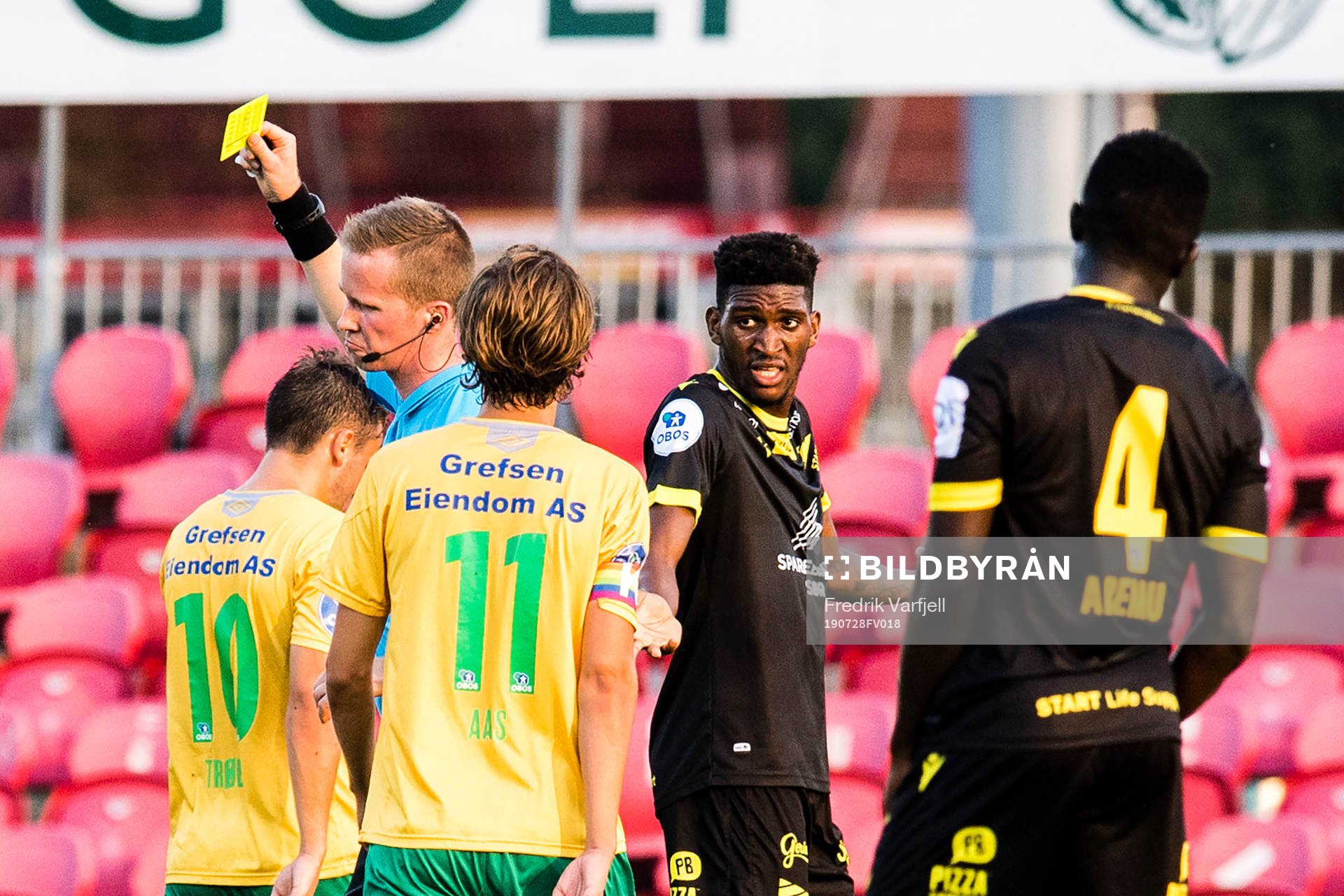 Damion Lowe of Start gets a yellow card