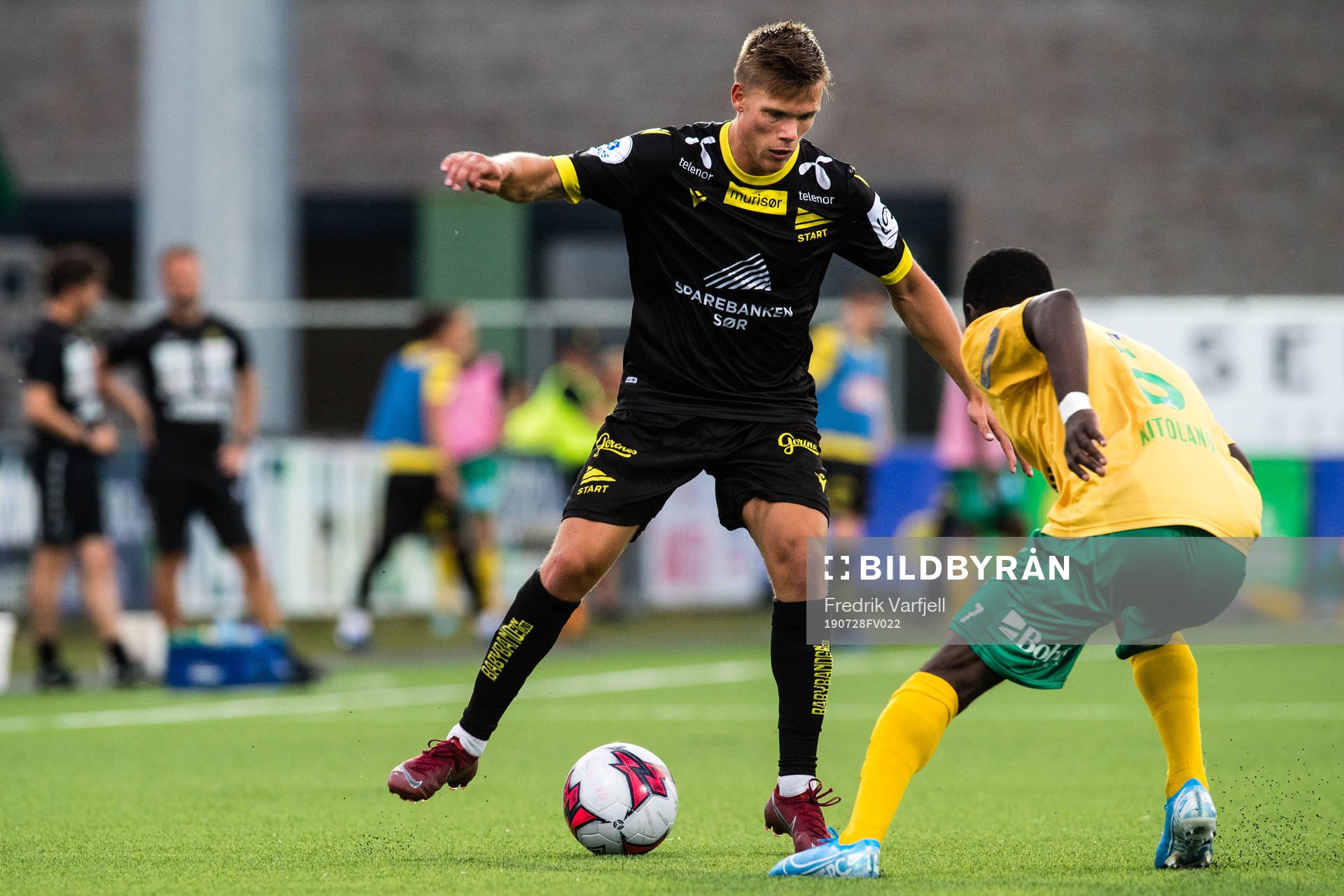 Eirik Wichne of Start and Eric Kitolano of Ull/Kisa during the OBOS-ligaen match between Ull/Kisa and Start on July 28, 2019 in Jessheim.
