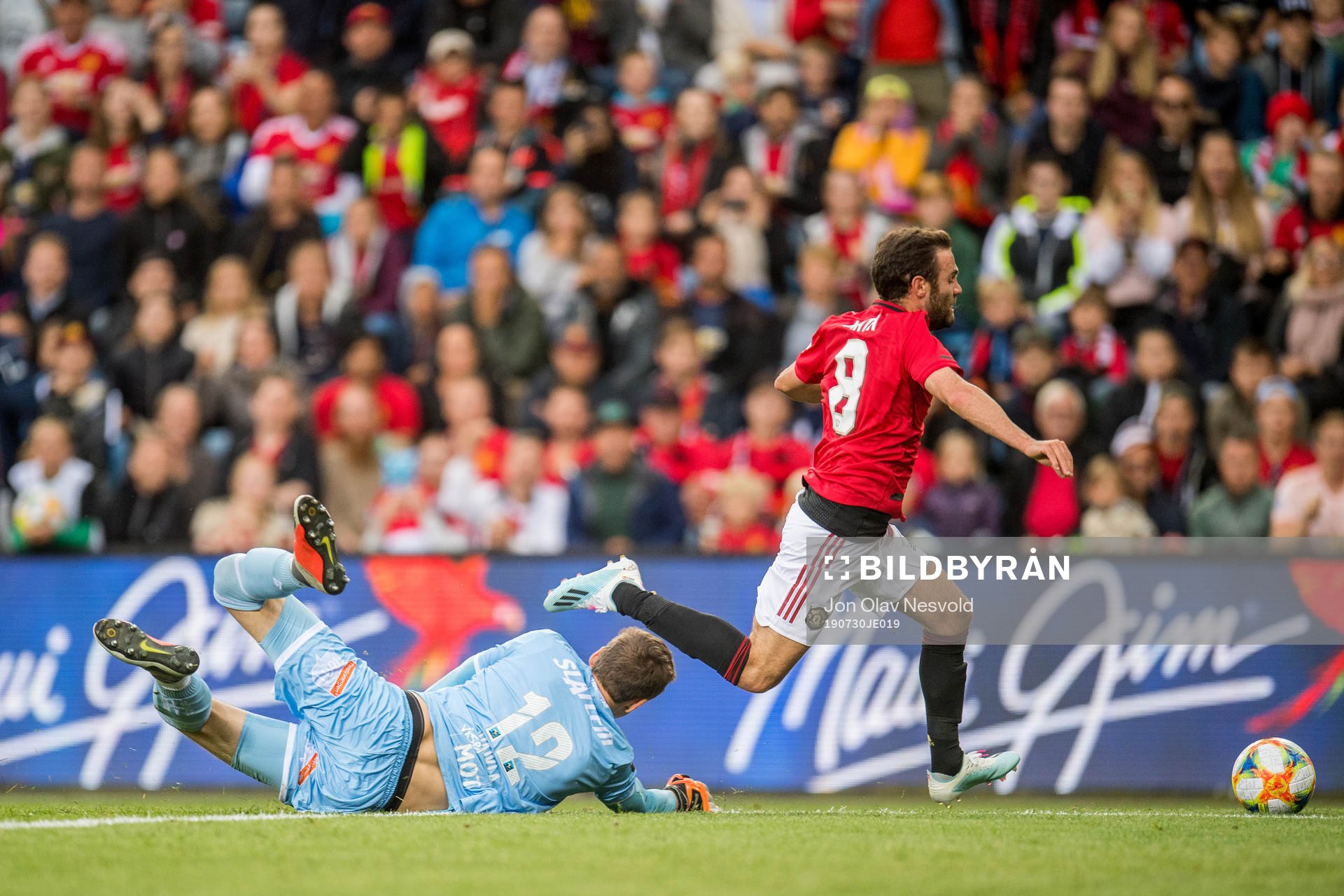 Goalkeeper Andreas Vaikla of Kristiansund and Juan Mata of