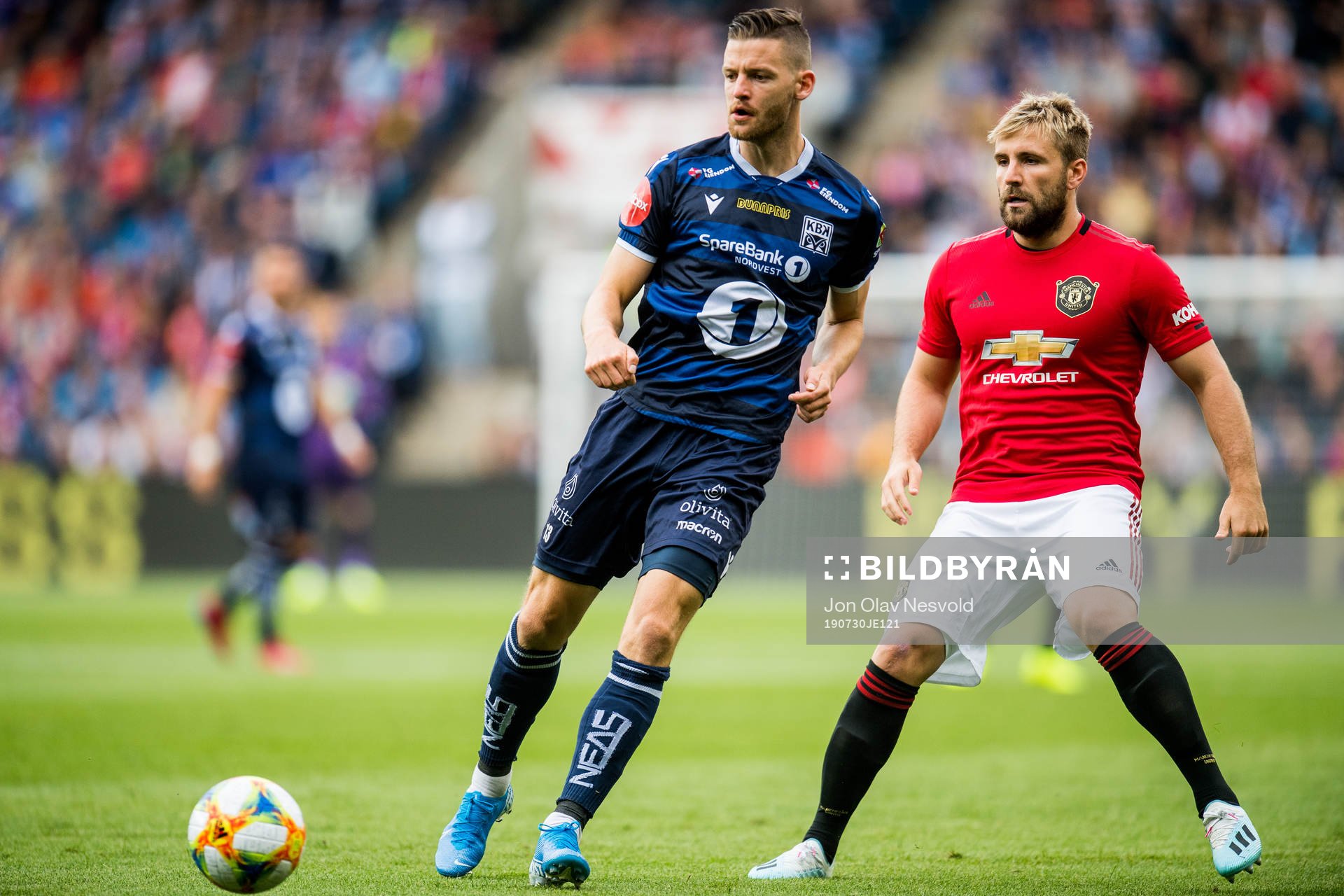 Bendik Bye of Kristiansund and Luke Shaw of Manchester