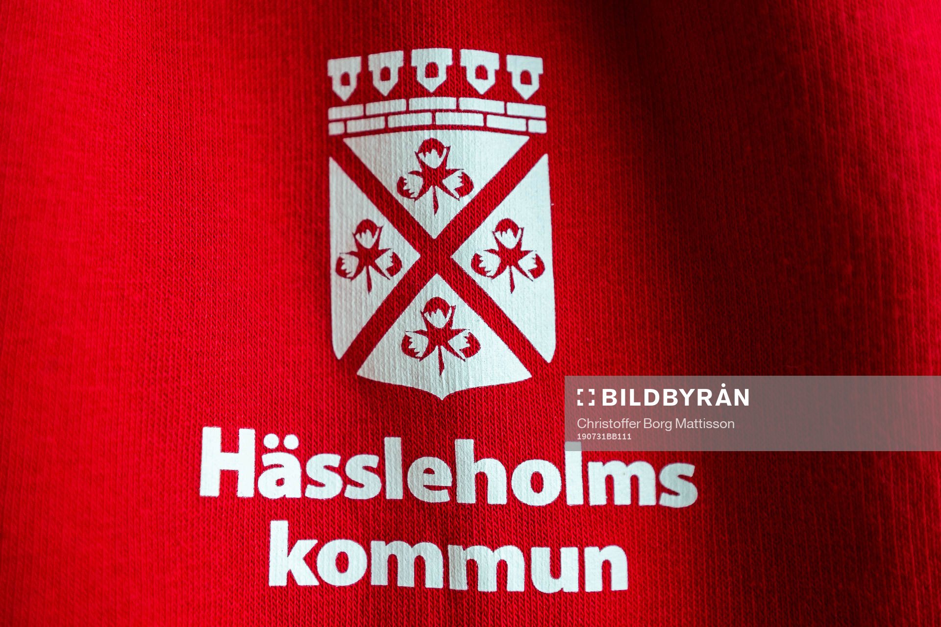 Tröja med Hässleholms kommuns logotype på