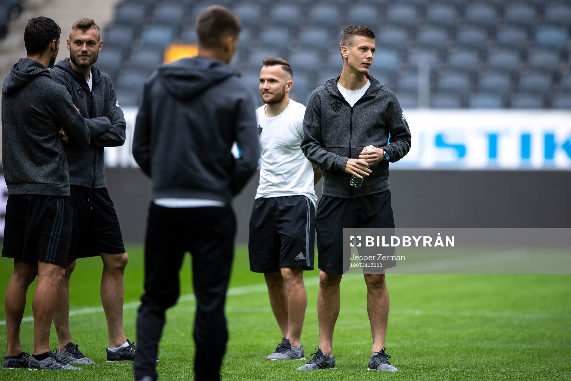Players of Maribor inspecting the pitch